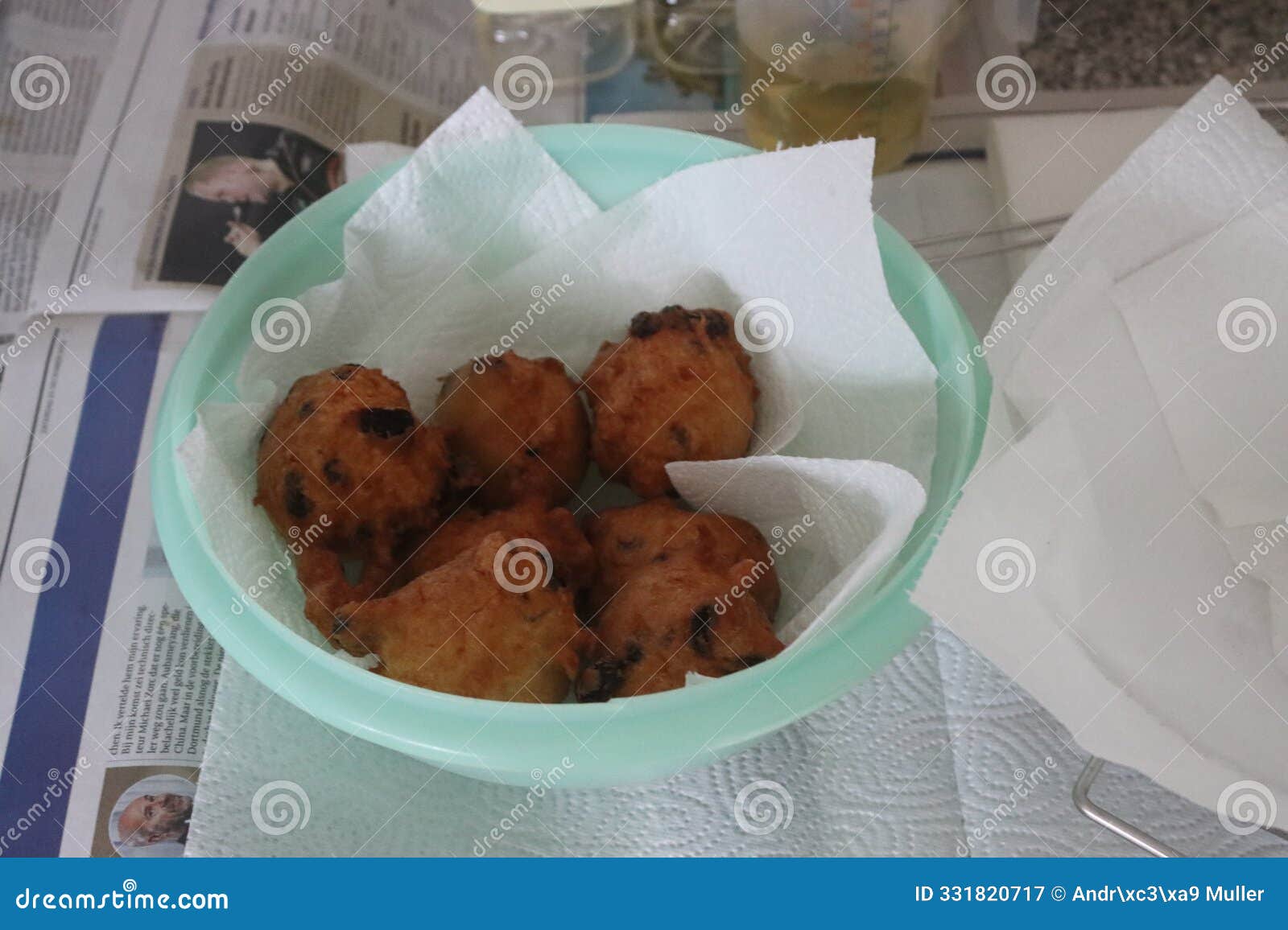 deep fried doughnut balls (oliebollen) baked on new year's eve as eating up