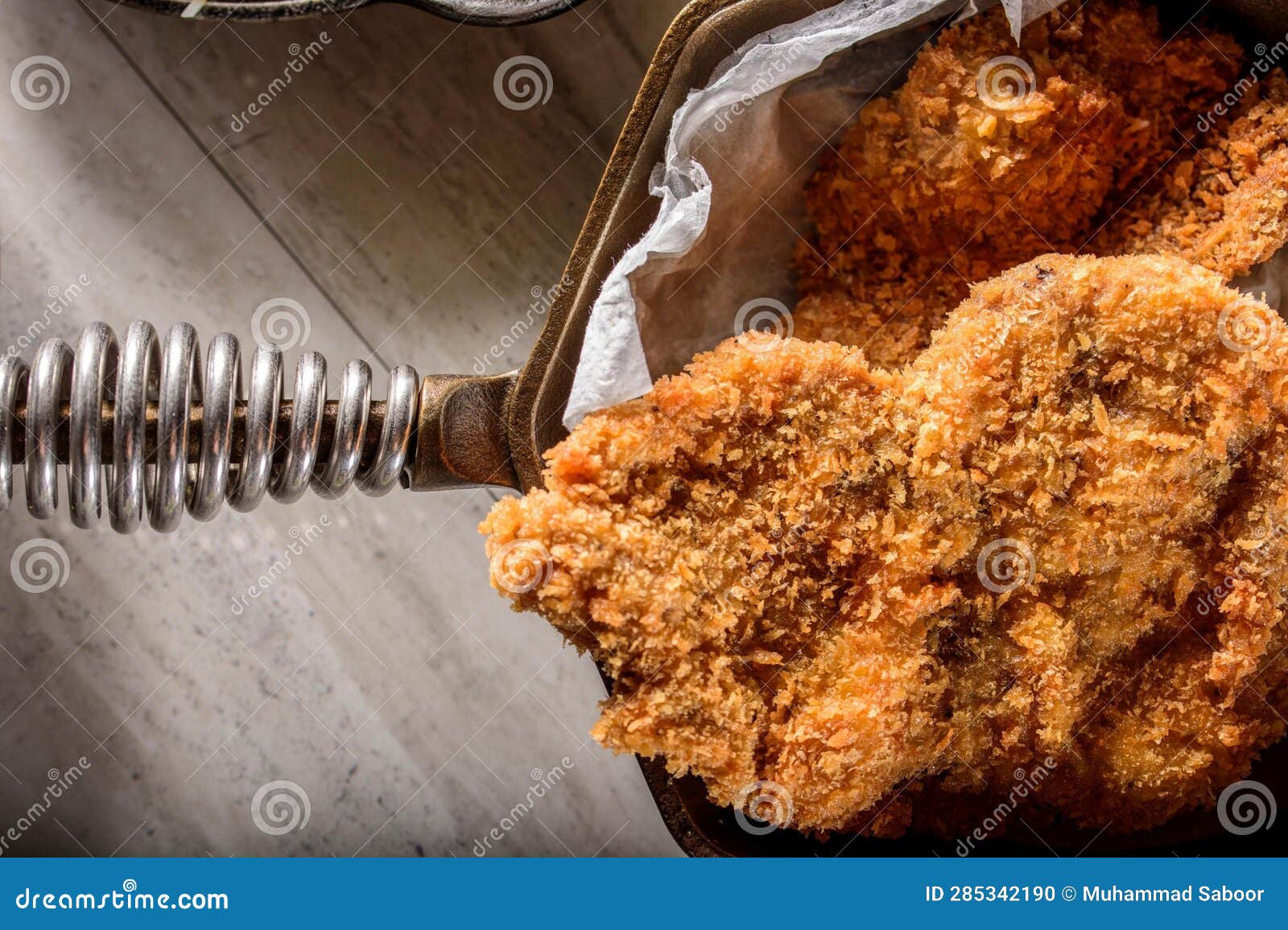DeepFried Orange Chicken Served on a Bed of Steamed White Rice