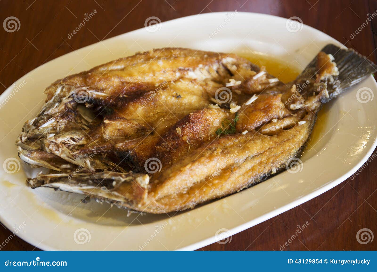 Deep fried Sea Bass fish stock photo. Image of fresh 43129854