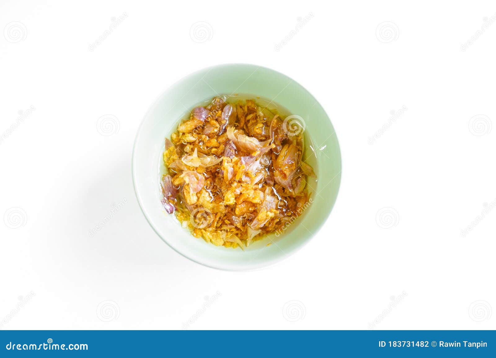 Deep Fry Garlic with Oil on Isolated White Background,fried Garlic