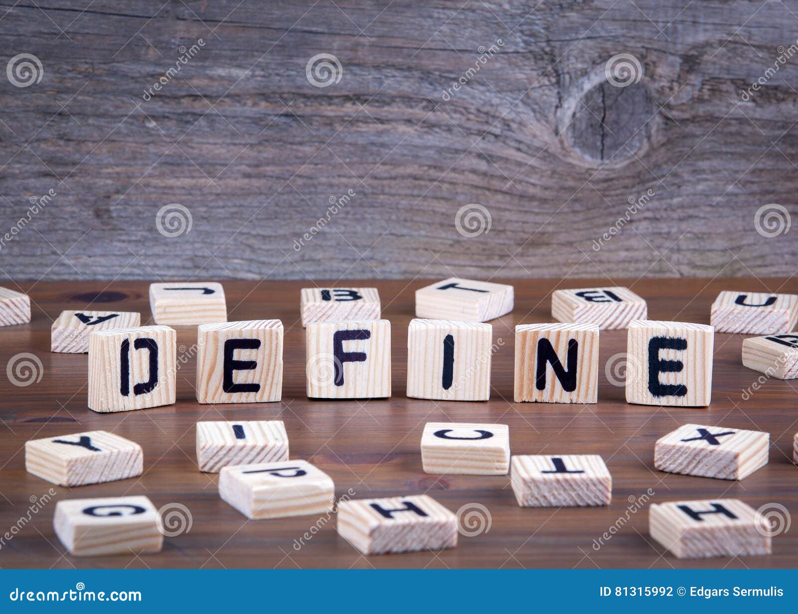 define from wooden letters on wooden background