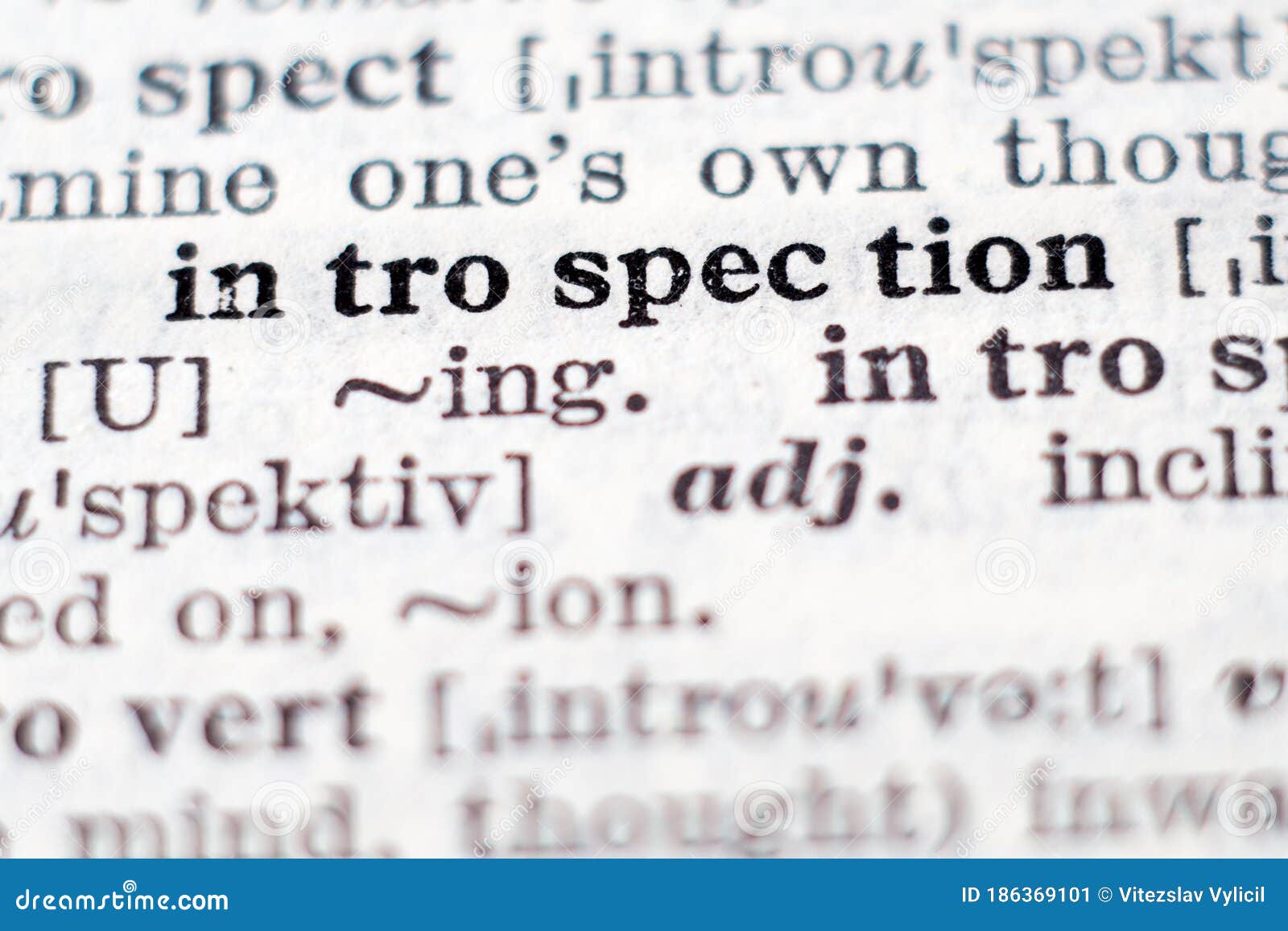 Introspection. Word Written On A Piece Of Paper, Cork Board Background