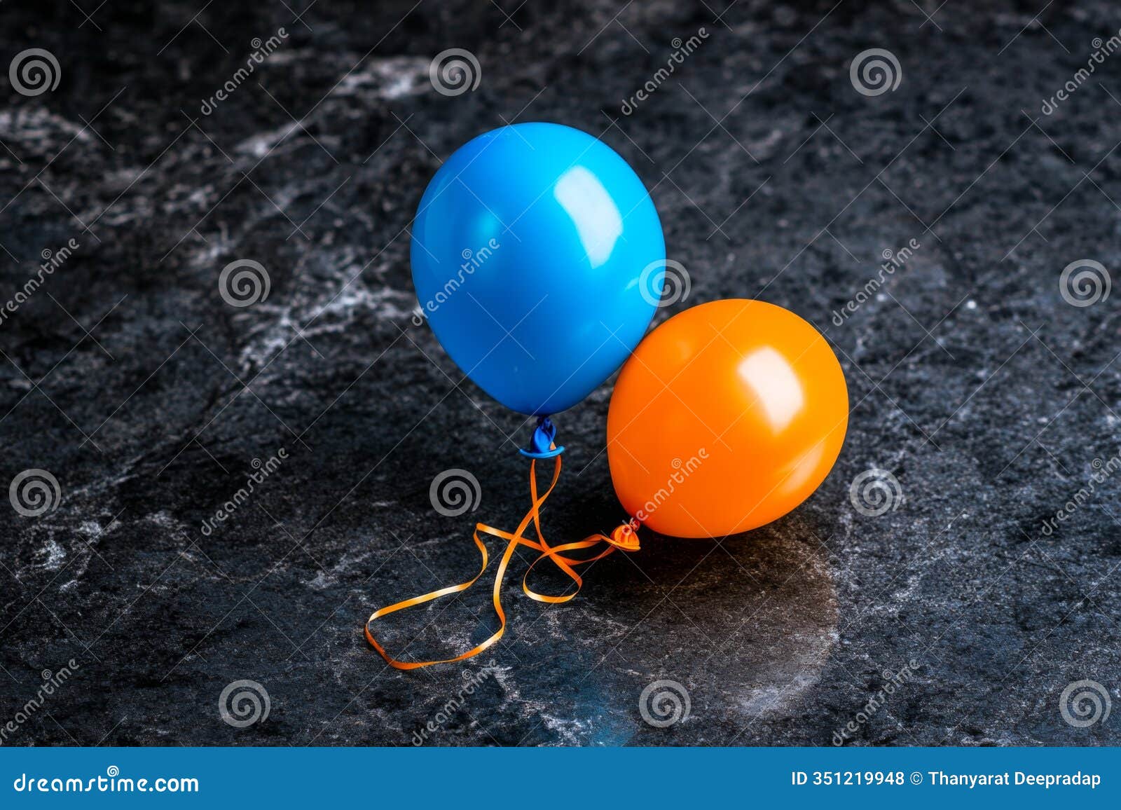 deflated balloon,  of past joy, lingering sadness represents the dichotomy of happiness and its eventual fading