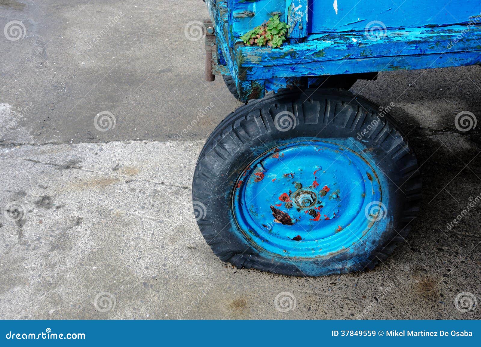 Deflated Tire with Wheel Flat Stock Image Image of wheelbarrow, hole