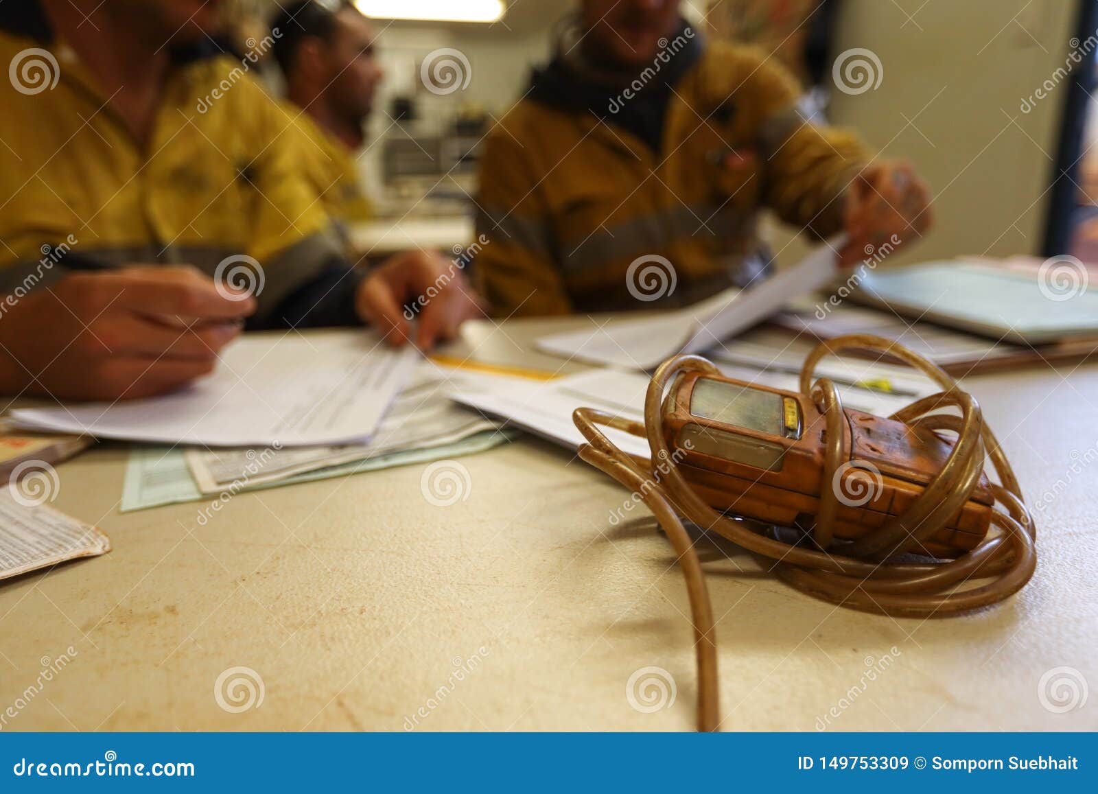 Defocused Group of Construction Works Help Each Other Written Job