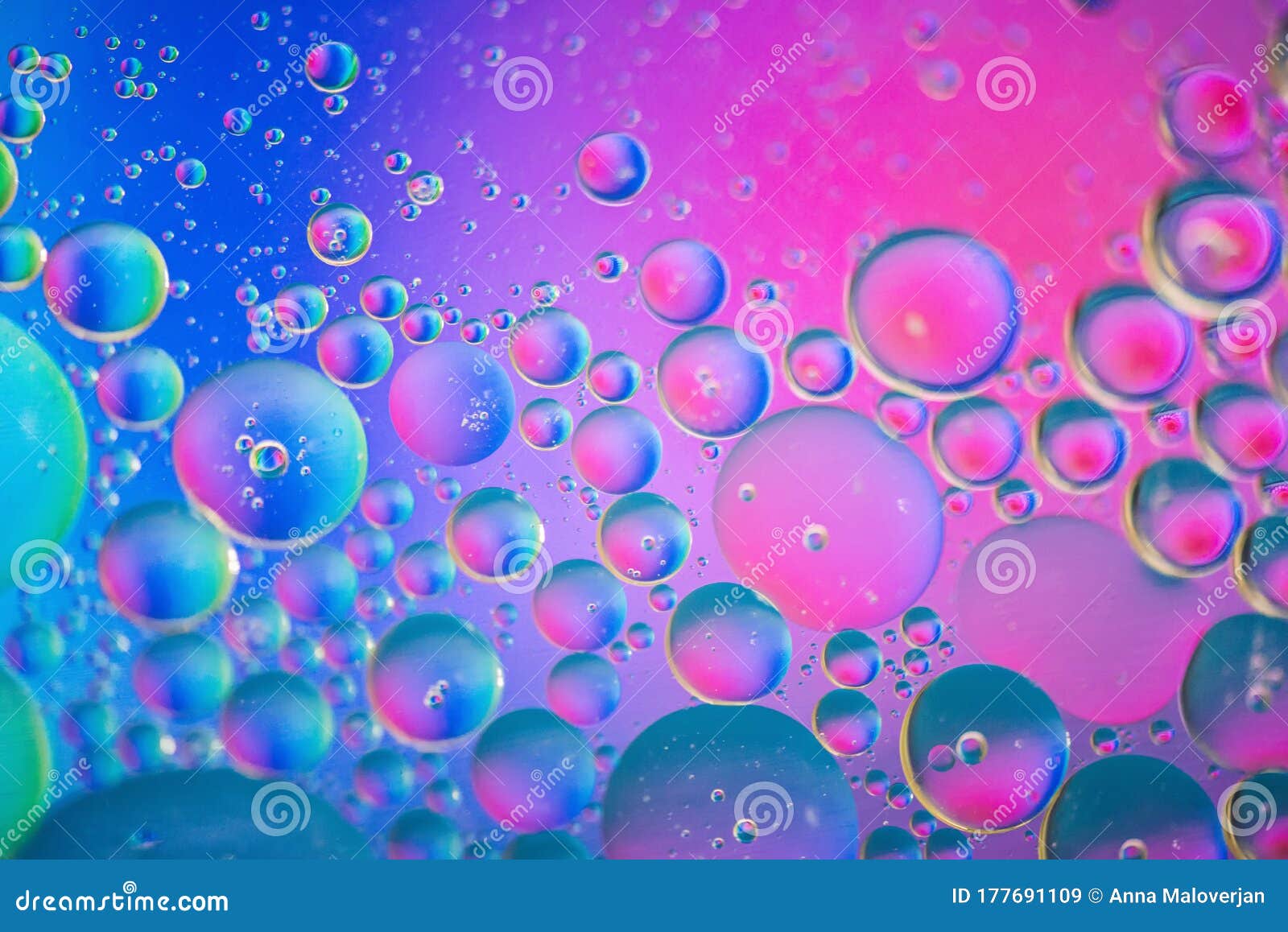defocused pink and blue abstract background picture made with oil, water and soap