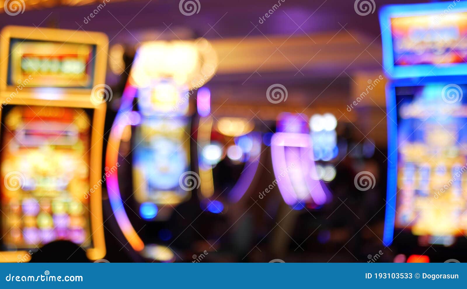 defocused slot machines glow in casino on fabulous las vegas strip, usa. blurred gambling jackpot slots in hotel near fremont