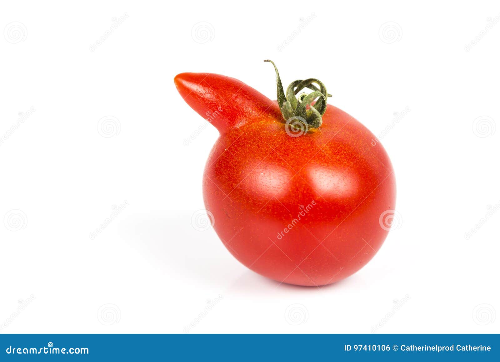 deformed red tomato on a white background