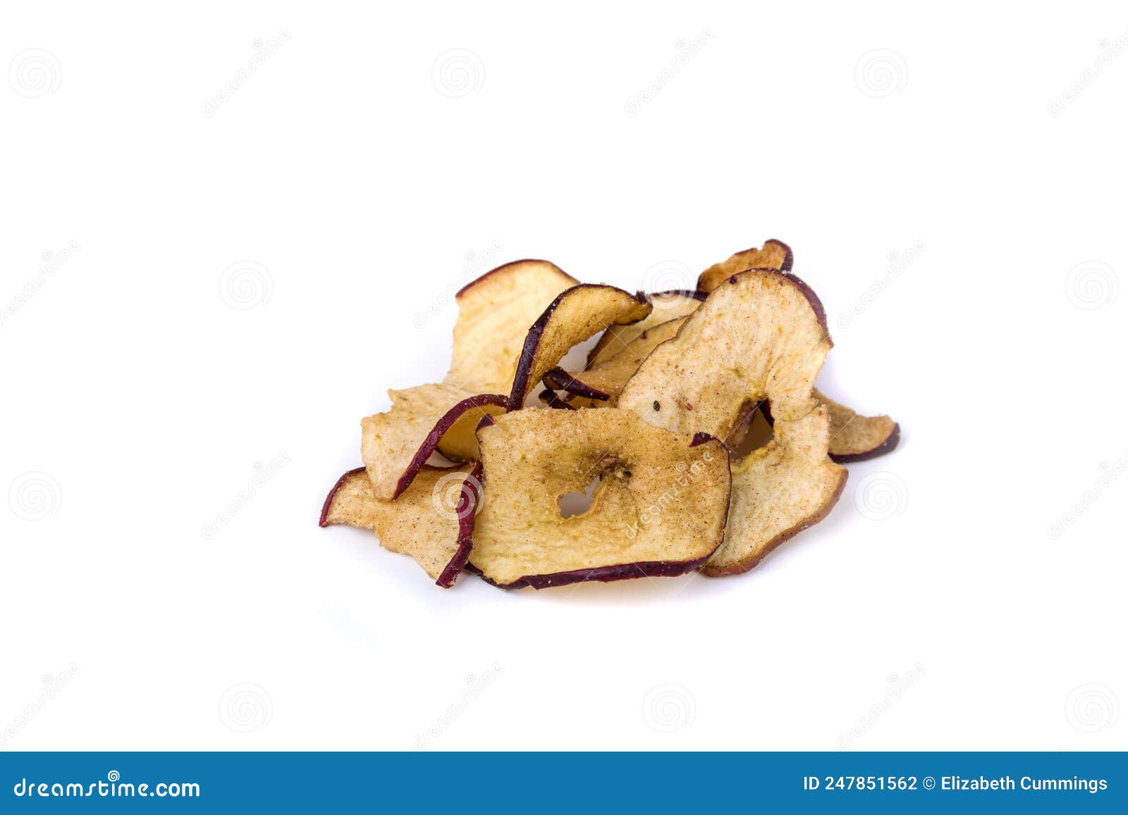 Dehydrated Apple Slices with Cinnamon and Sugar Sprinkles Over White