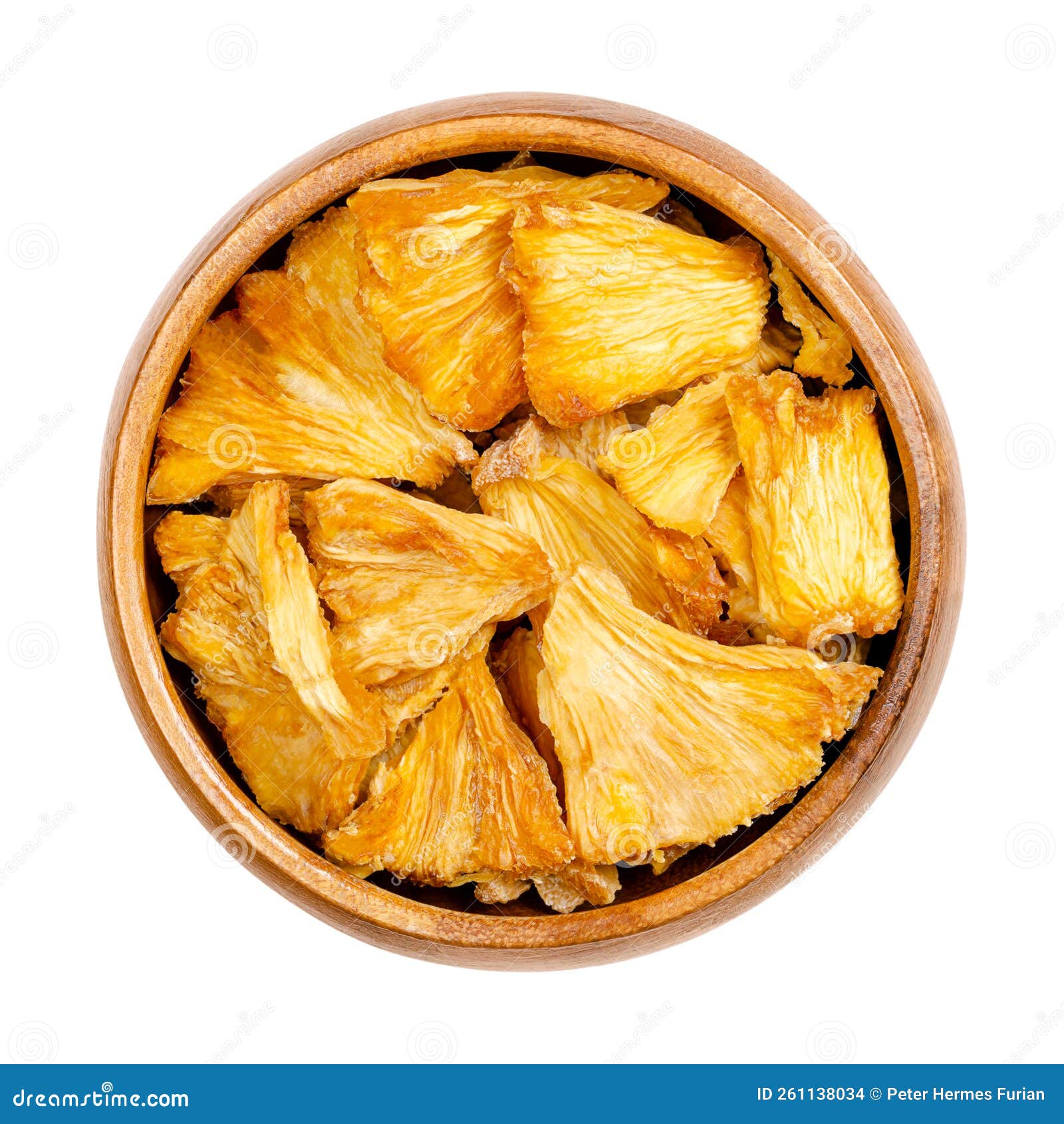 Dehydrated Pineapple Pieces, Chunks of Dried Fruits, in a Wooden Bowl