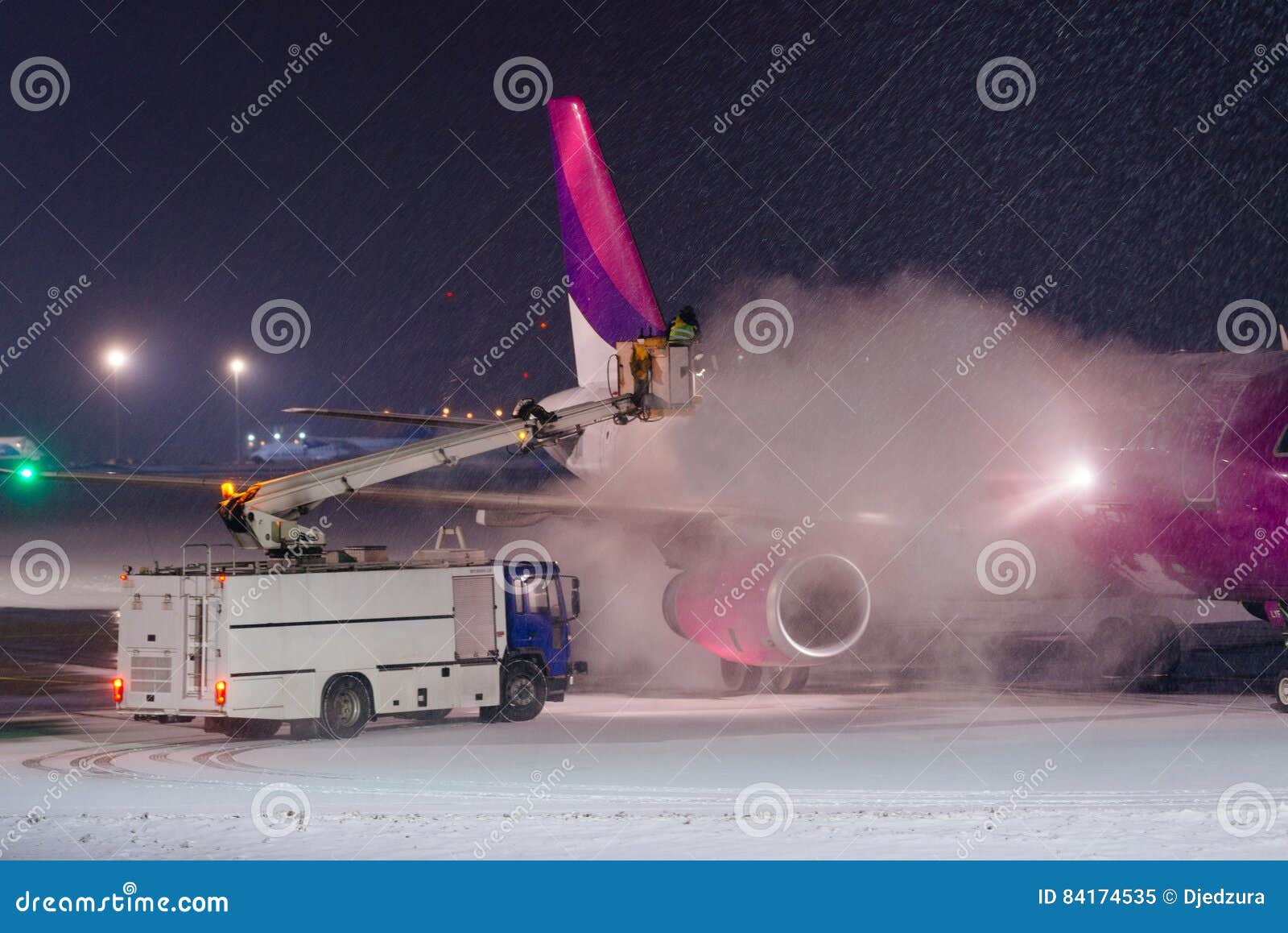 Deicing plane with glycol editorial image. Image of frozen 84174535