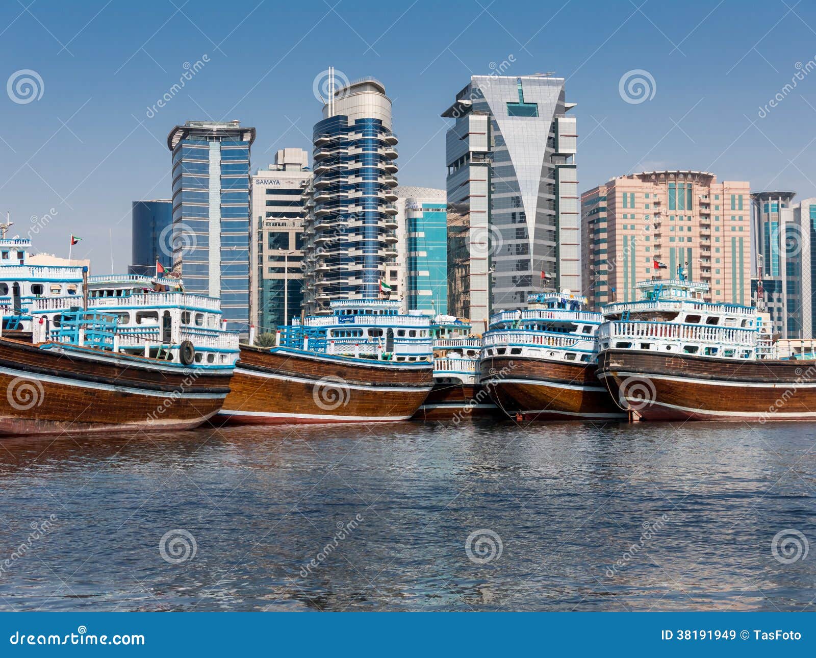 Deira Dhow Wharfage and Modern Buildings in Dubai Editorial Stock Image