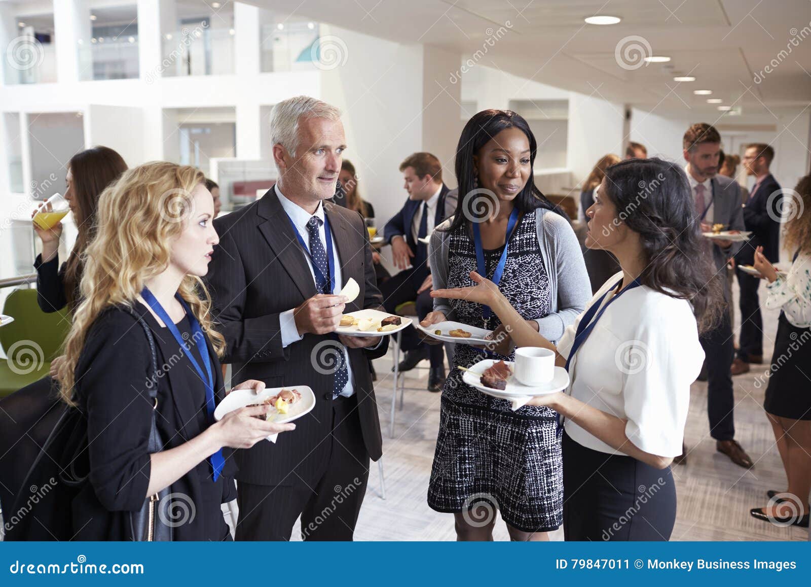 delegates networking during conference lunch break