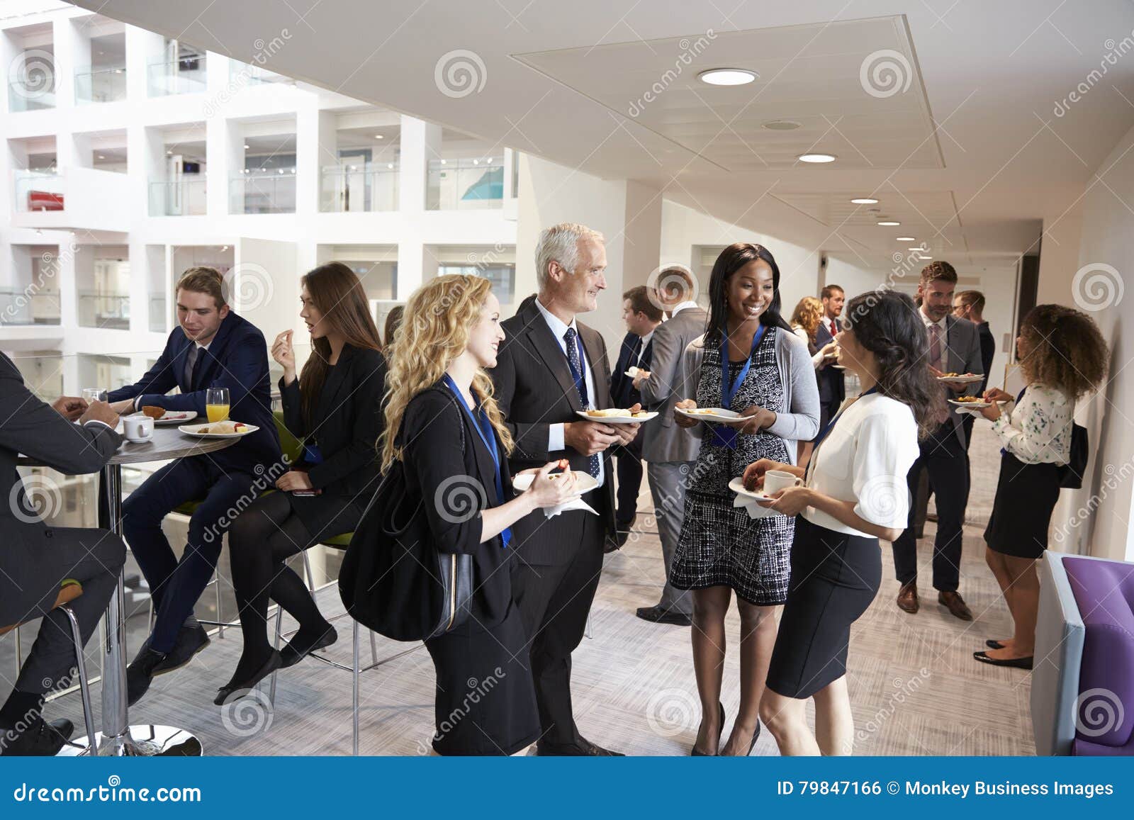 delegates networking during conference lunch break