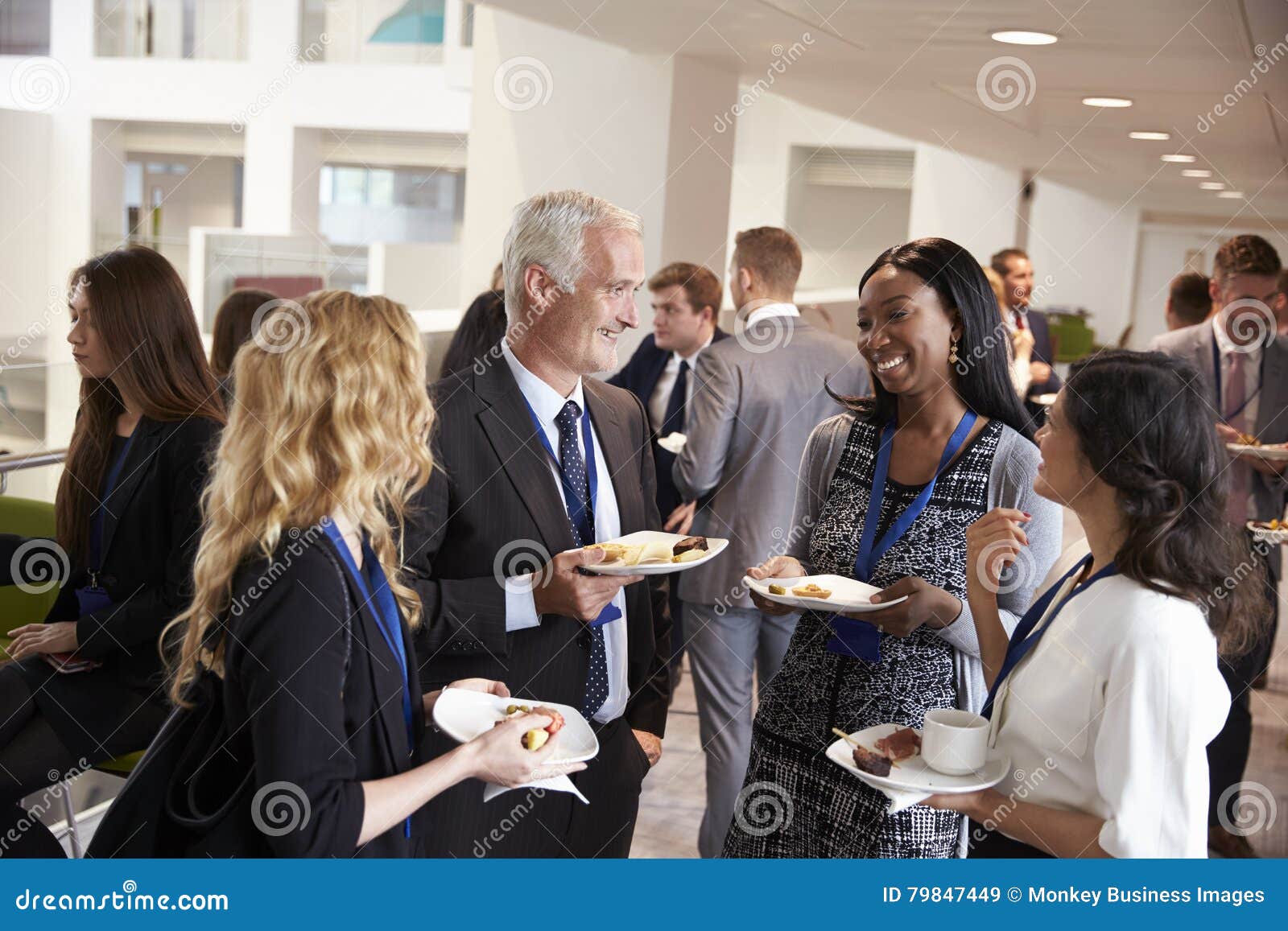 delegates networking during conference lunch break