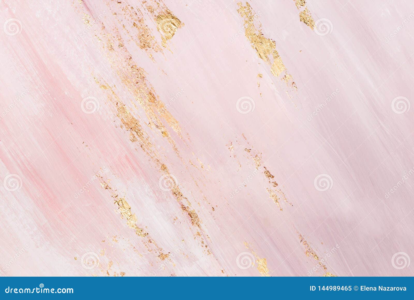 delicate pink marble background with gold brushstrokes. place for your 