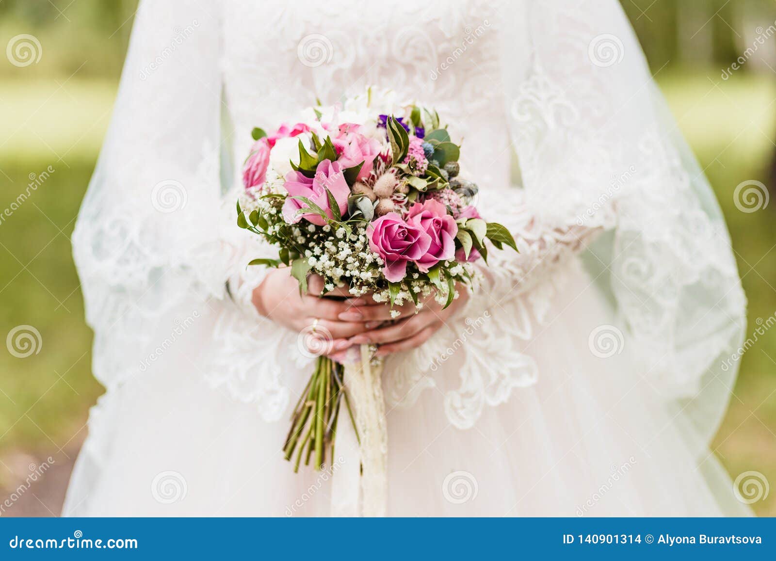 Delicate Stylish Bouquet of Roses in the Hands of the Bride Outdoors ...