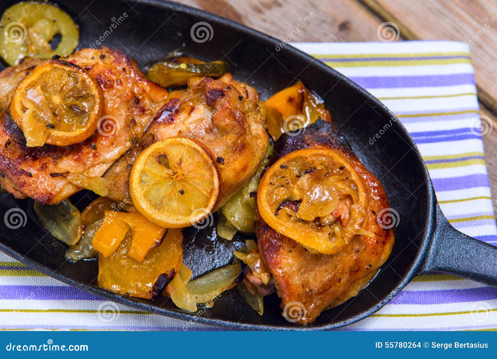 Delicious Baked Chicken Thighs with Lemon Slices, Onion and Zucchini ...