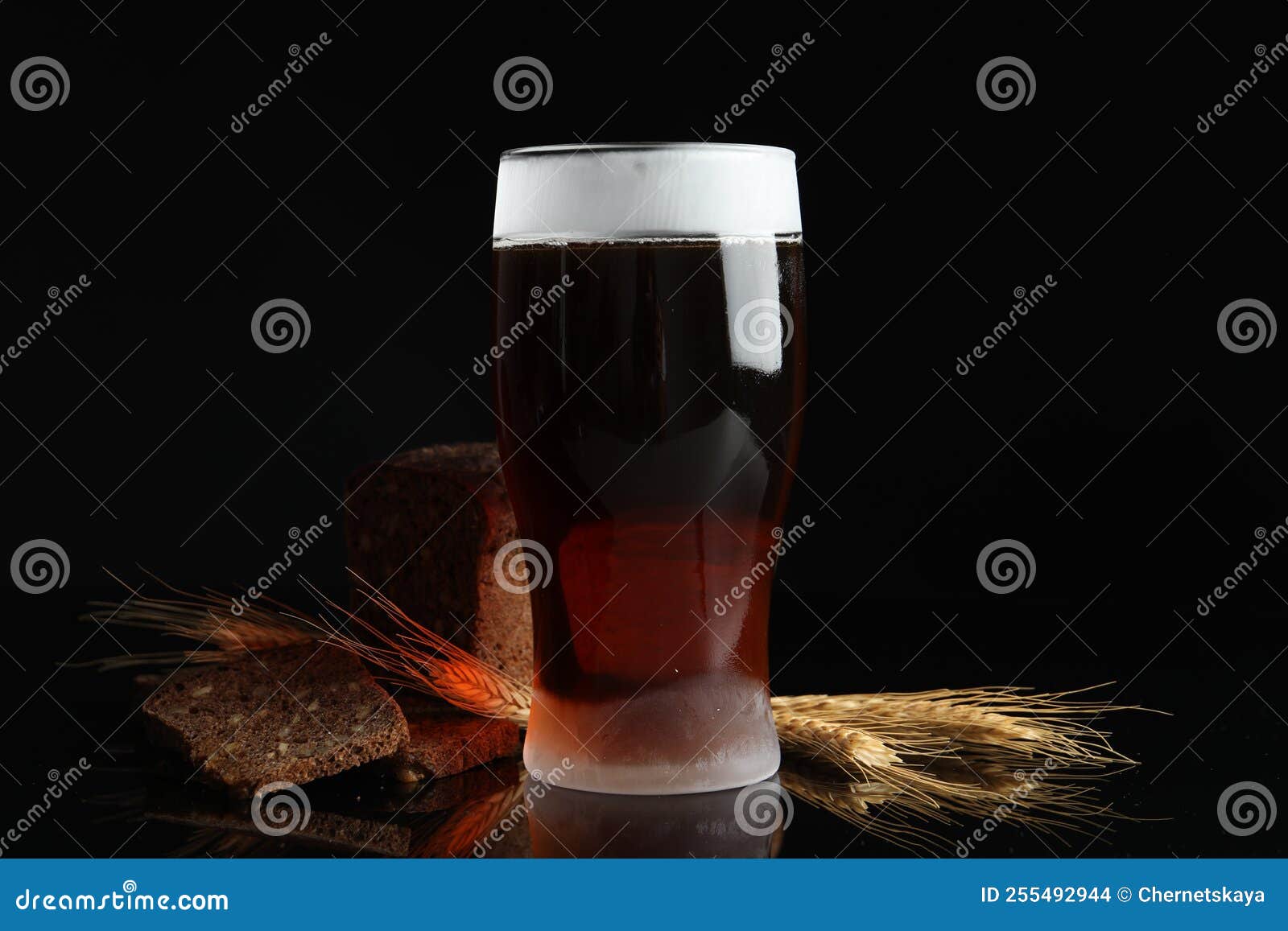 Delicious Cold Kvass, Bread and Spikes on Black Background Stock Photo
