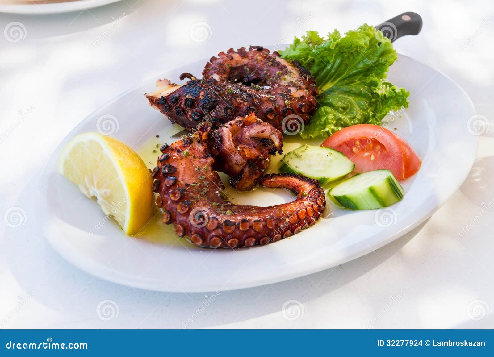 Delicious Cooked Octopus, Served On A Plate Stock Photo Image of