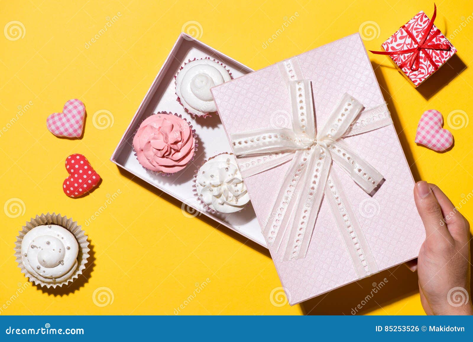 Download Delicious Cupcake With Paper Box On Yellow Background Stock Photo Image Of Birthday Muffin 85253526 Yellowimages Mockups