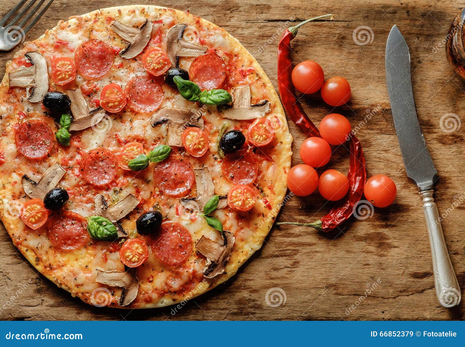 Delicious Fresh Pizza with Mushrooms, Cherry and Pepperoni Serve Stock