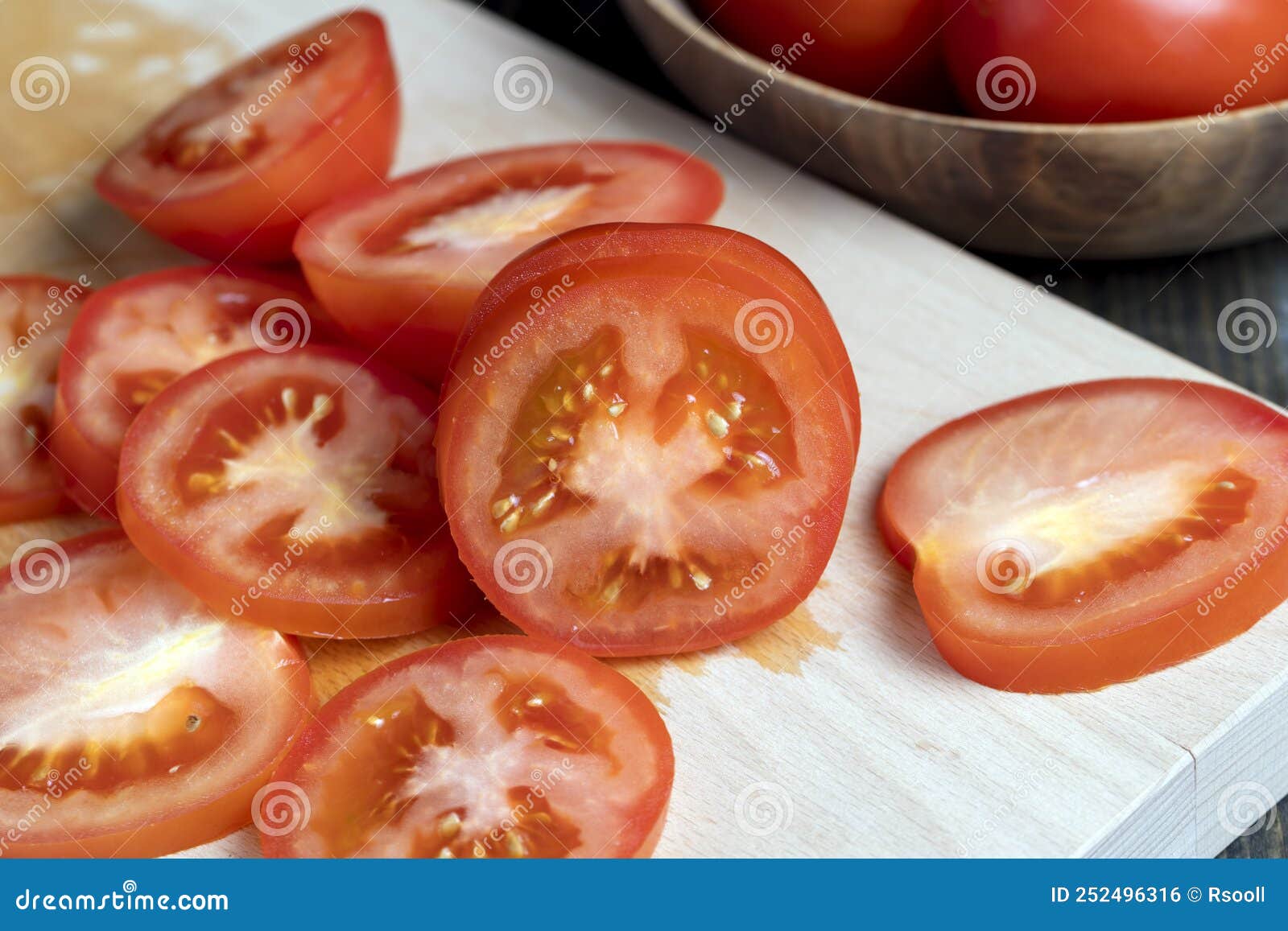 Delicious Fresh Tomato Cut into Chunks on the Table Stock Photo Image