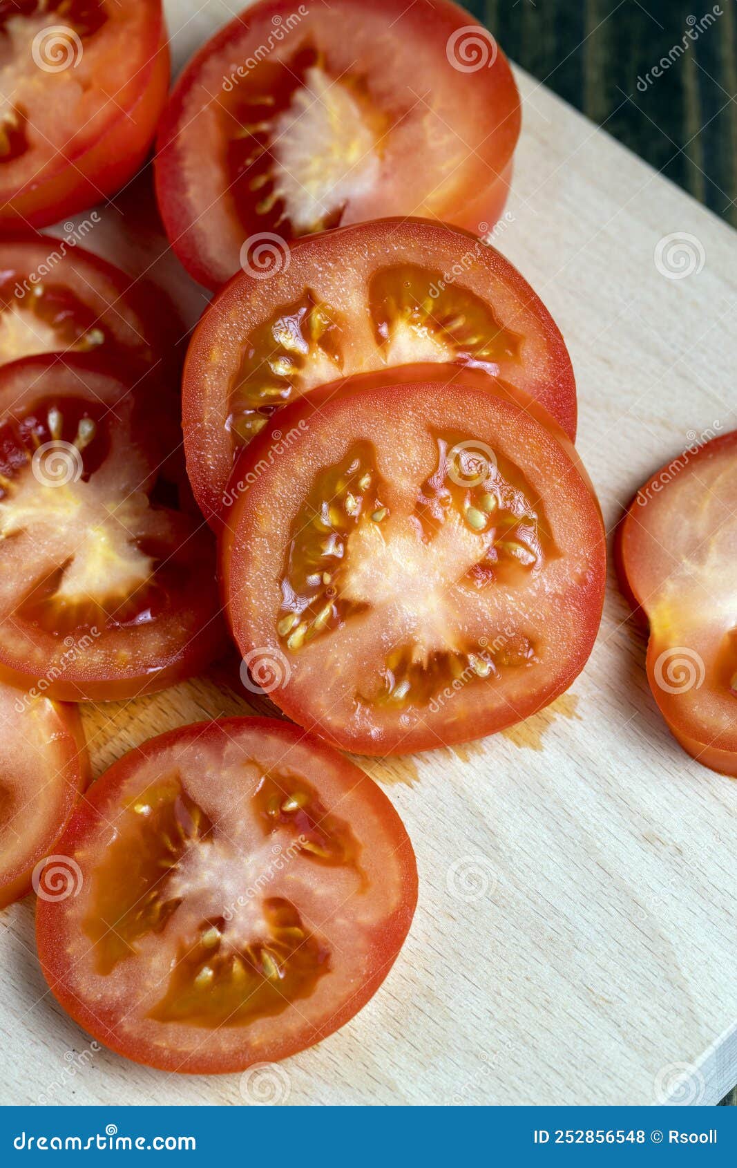 Delicious Fresh Tomato Cut into Chunks on the Table Stock Photo Image