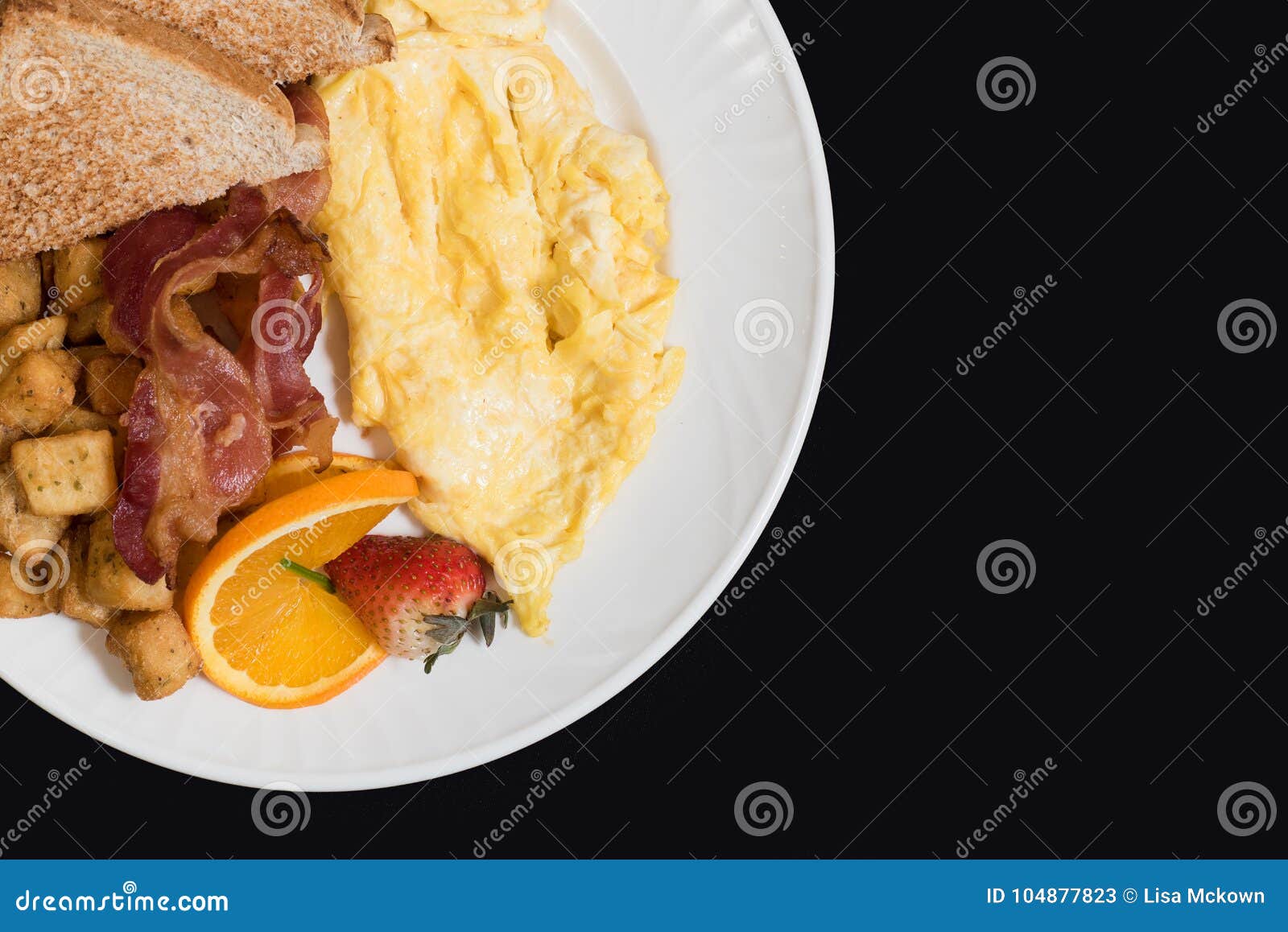 Breakfast with Bacon, Potatoes, Eggs and Toast Stock Image - Image of