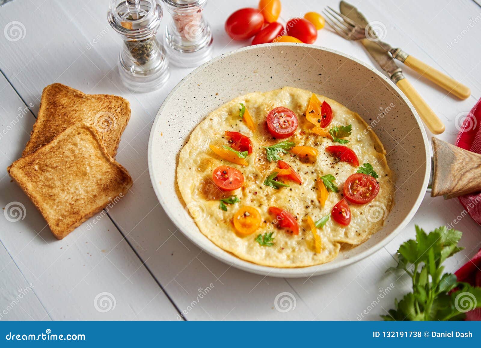 Delicious Homemade Egg Omelette with Tomatoes and Parsley Stock Photo ...