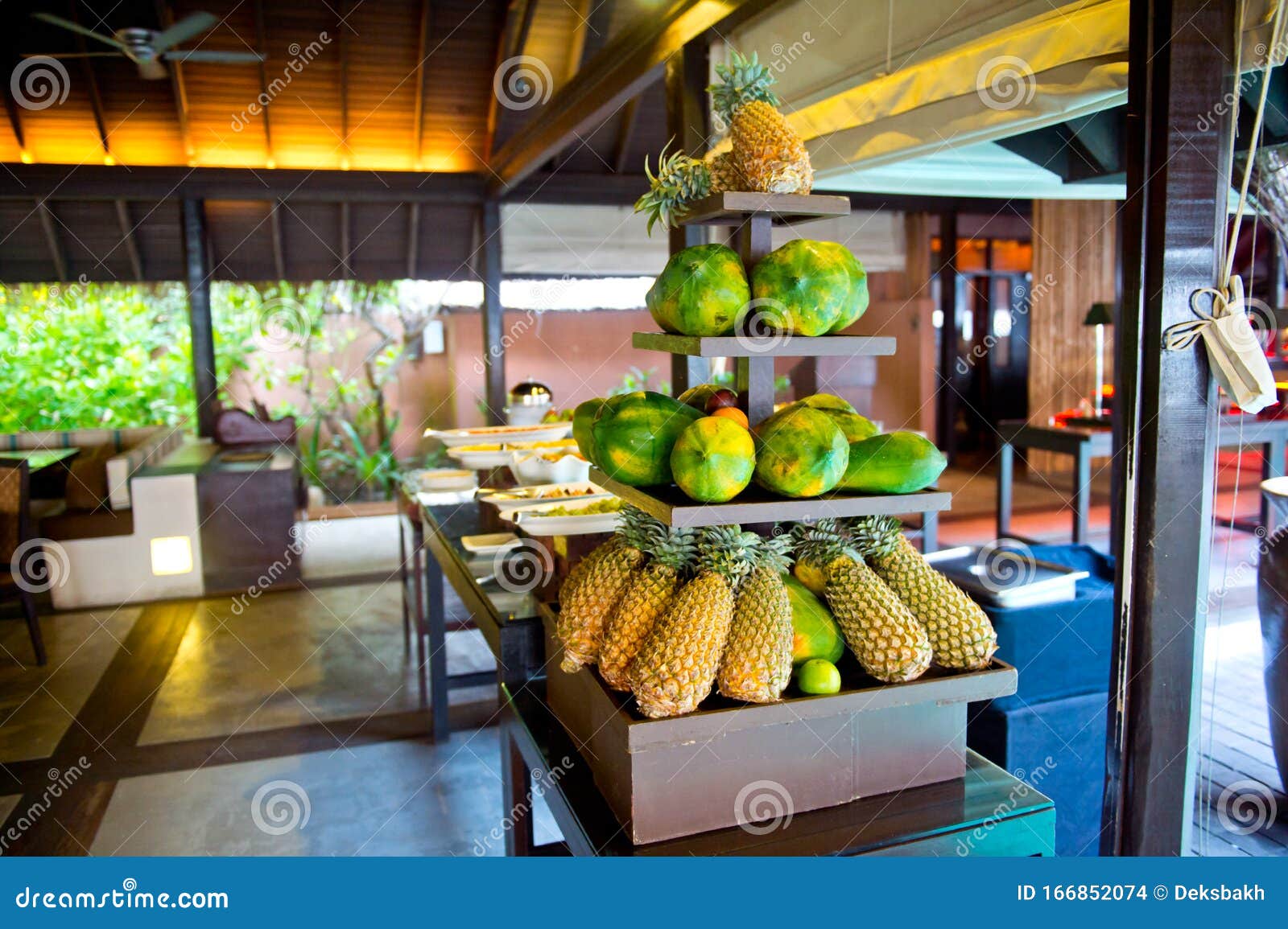 delicious hotel restaurant allinclusive buffet with tasty food. fruit papaya, pineapple