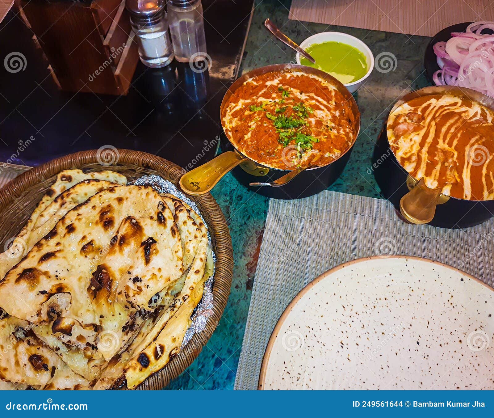 Delicious Indian Dishes with Tandoori Bread Served at Dinner from