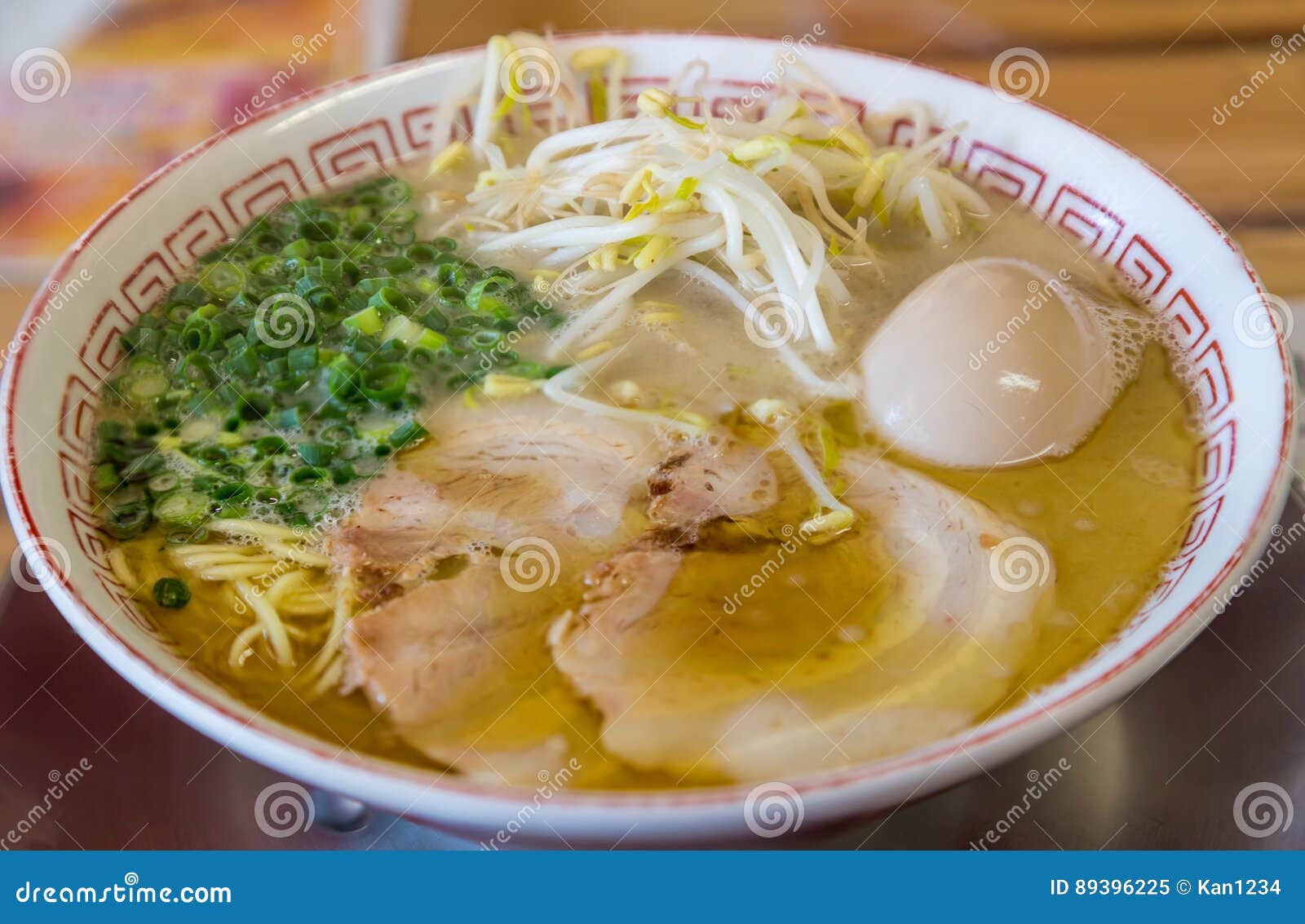 Delicious Japanese Chashu Ramen with Boiled Egg and Vegetable Stock
