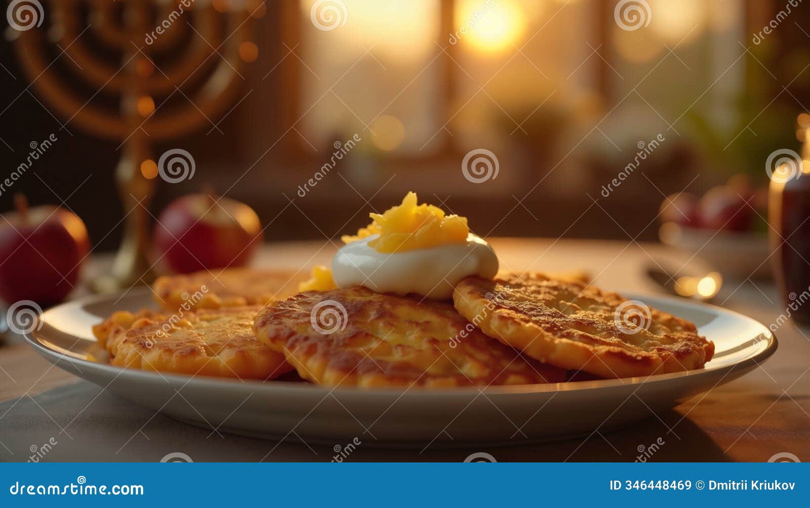 delicious latkes with apples and sour cream at sunset