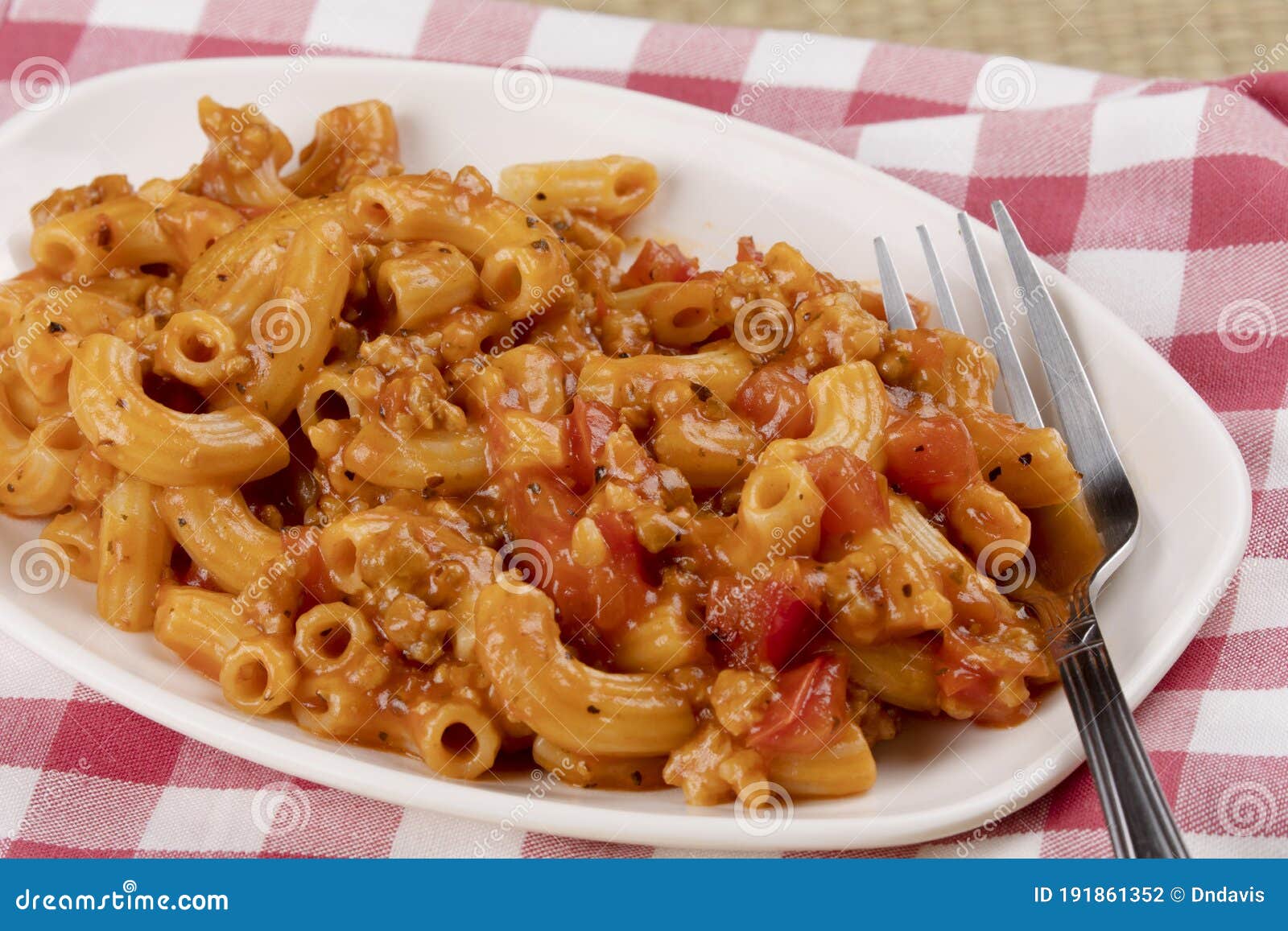 Delicious Meal of Elbow Macaroni with Pasta Sauce, and Tomatoes Stock