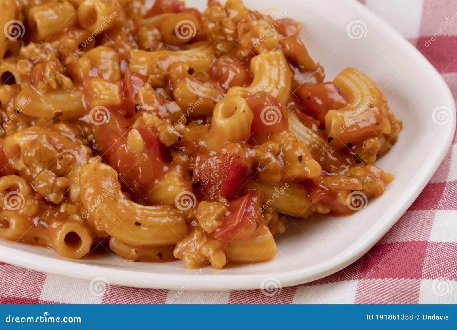 Delicious Meal of Elbow Macaroni with Pasta Sauce, and Tomatoes Stock