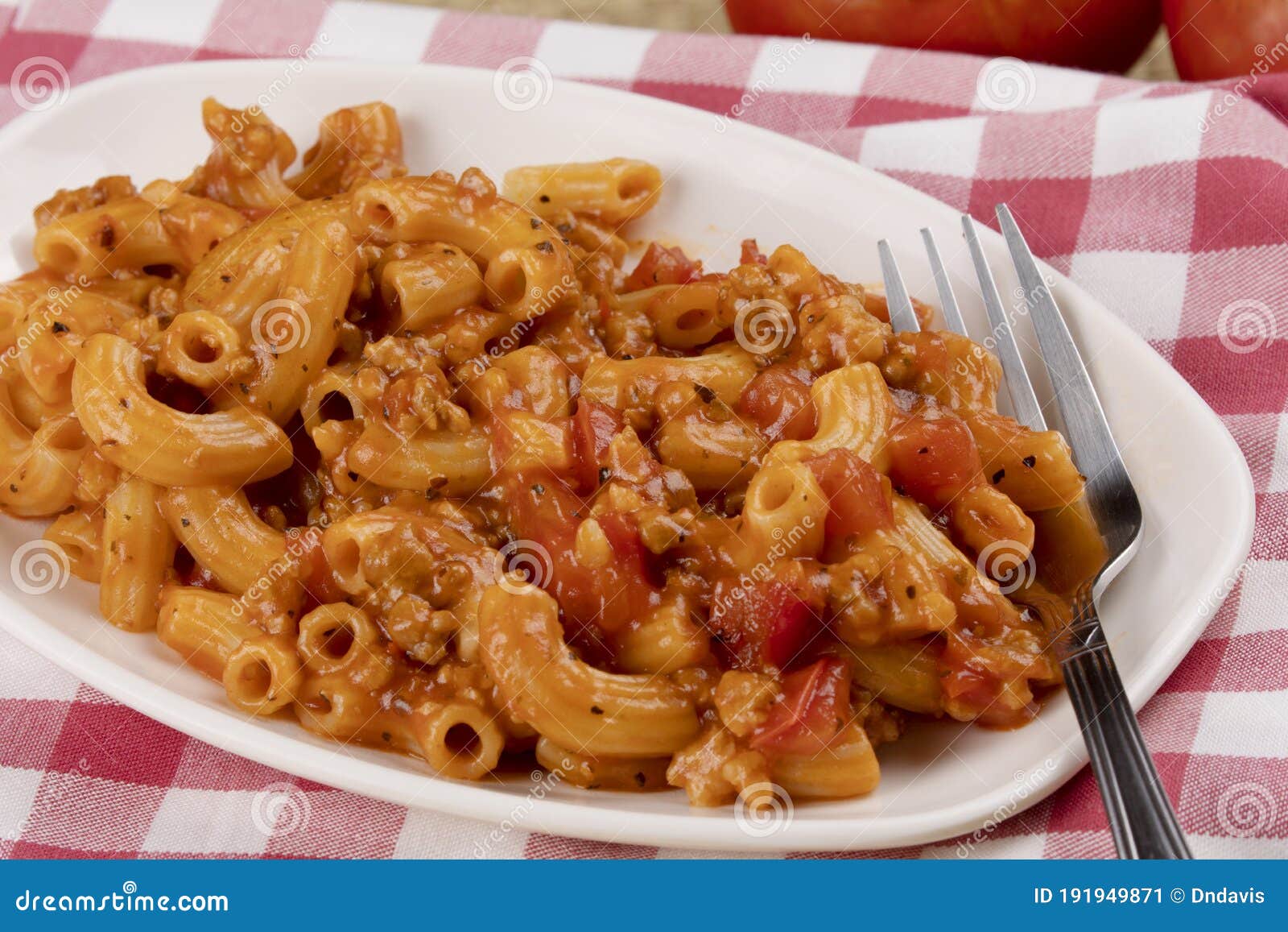 Delicious Meal of Elbow Macaroni with Pasta Sauce, and Tomatoes Stock