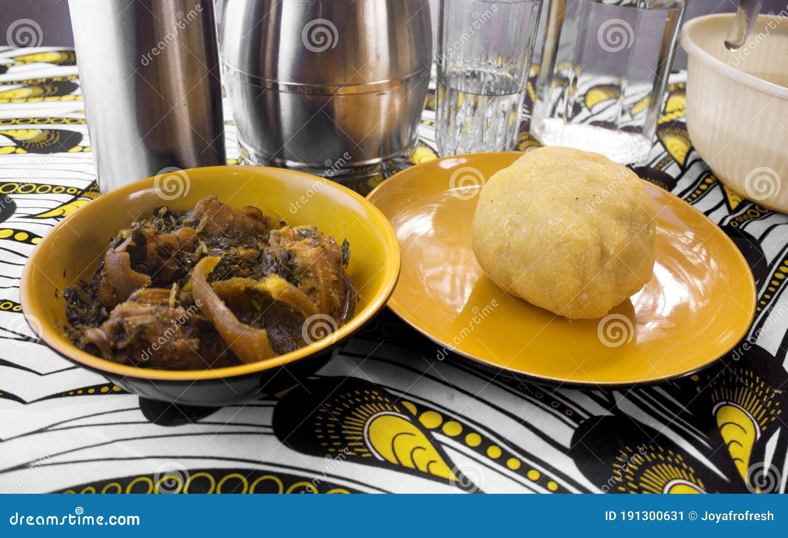 a delicious meal of nigerian garri or eba and vegetable soup