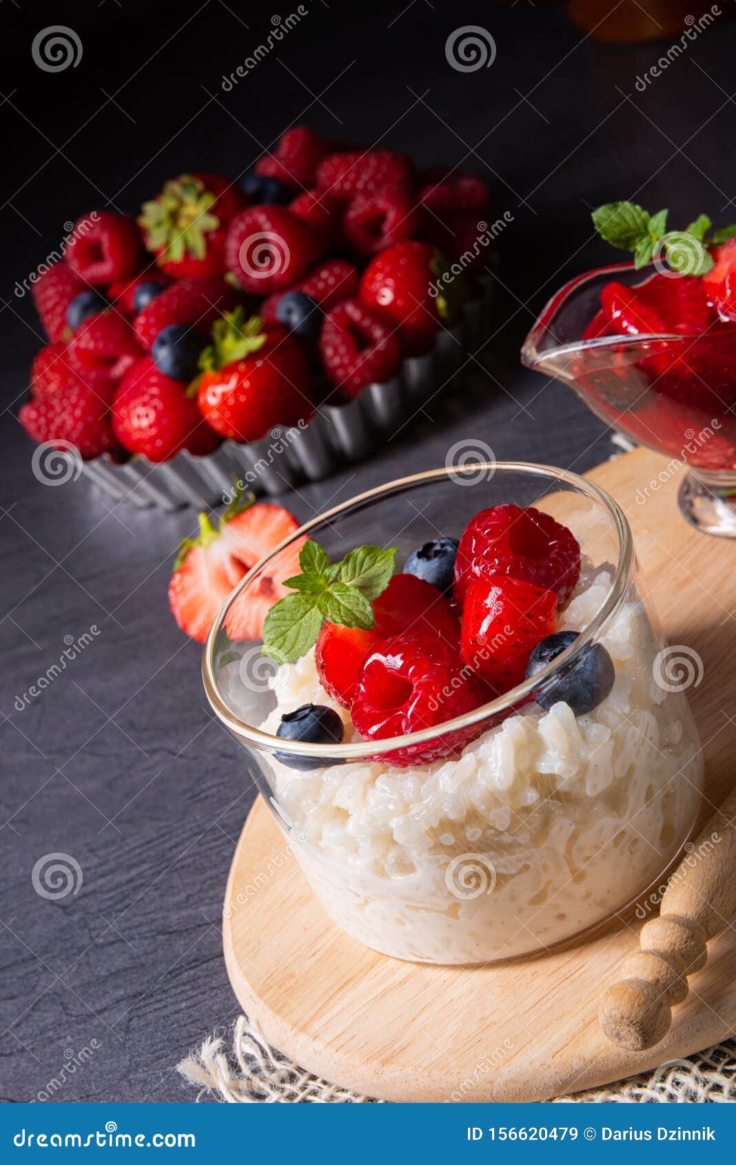 Delicious Milk Rice with Different Berries and Red Fruit Jelly Stock