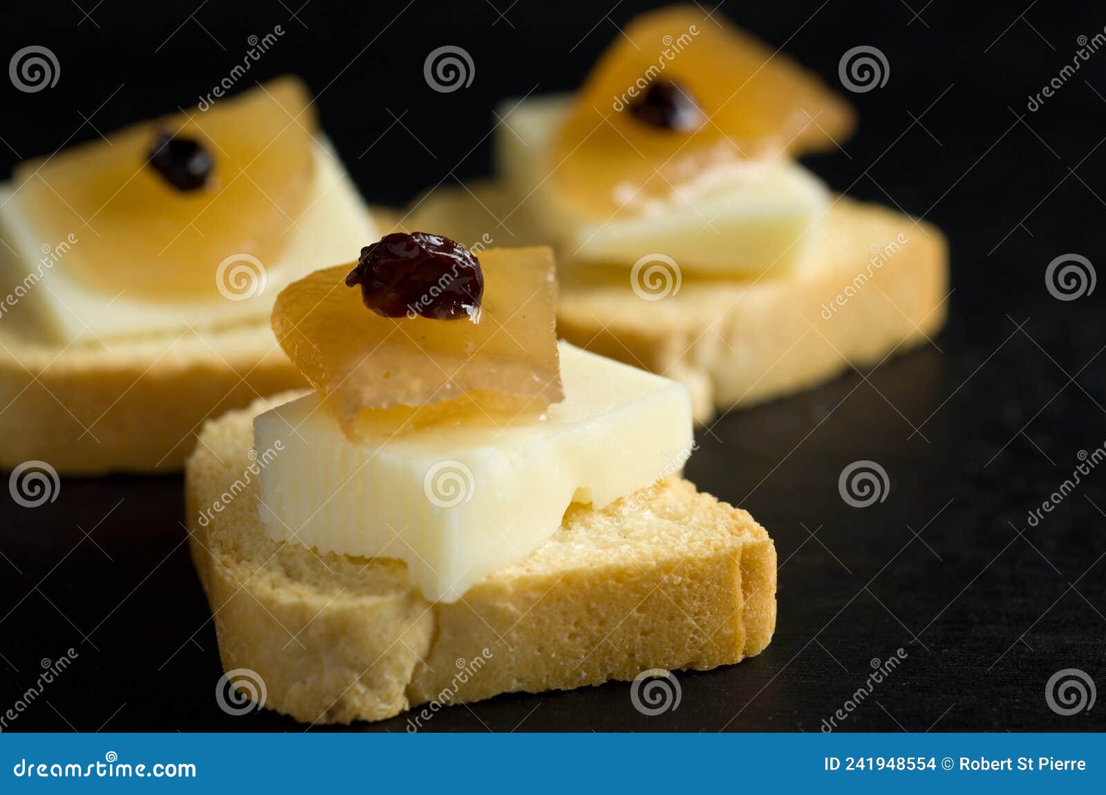 Delicious Mini Crackers with Apple, Cheese and Raisins Stock Photo