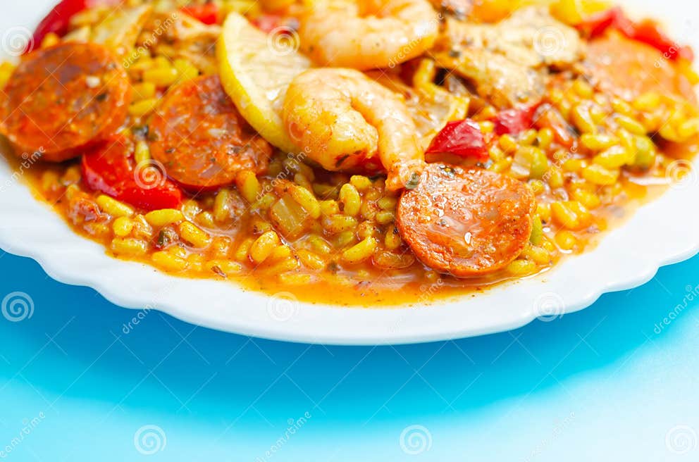 Delicious Paella, Cooked Risotto Rice with Chicken Thigh, King Prawns