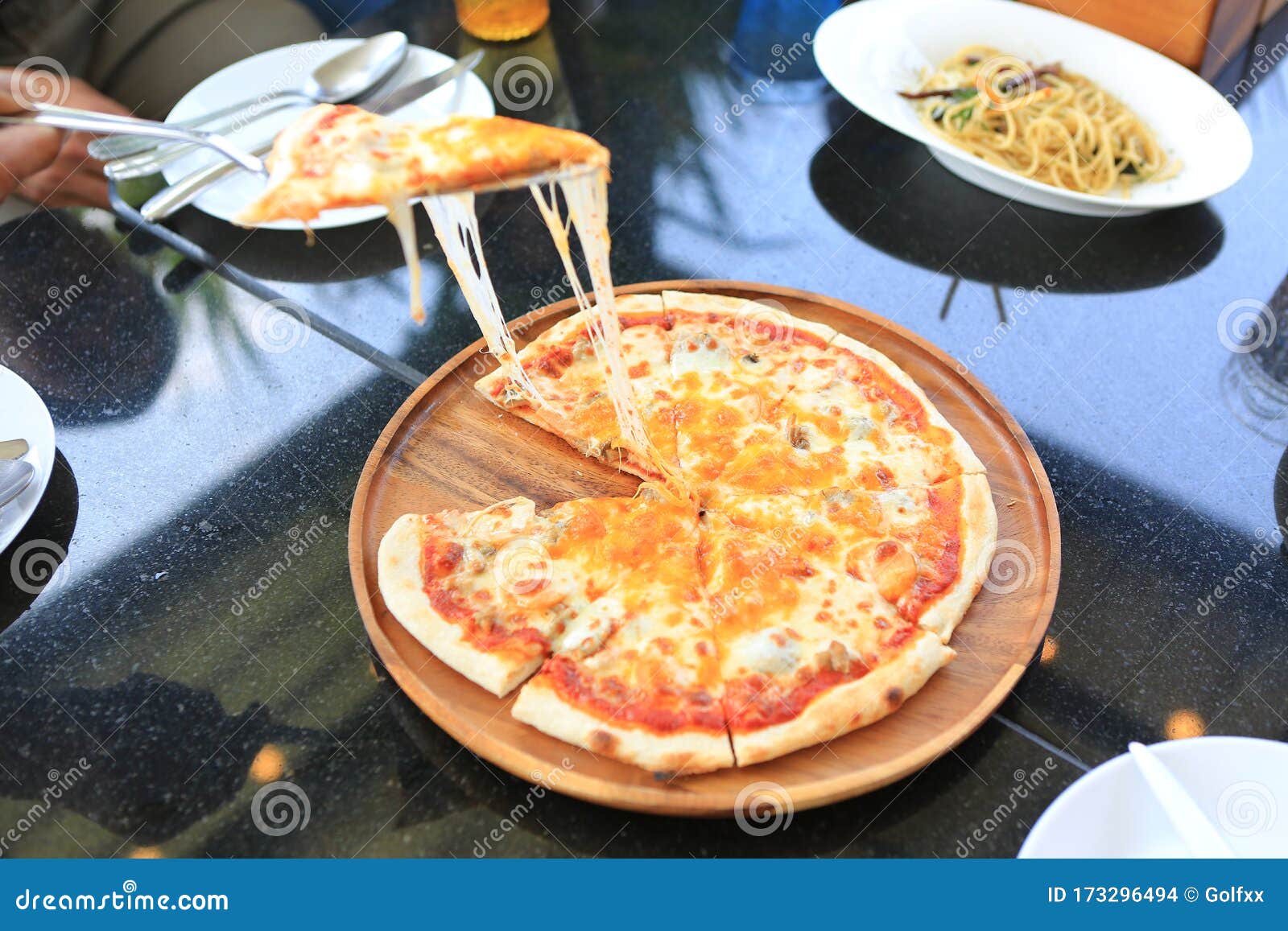 Delicious Pizza with Cheese Stretch while Eating Stock Photo Image of
