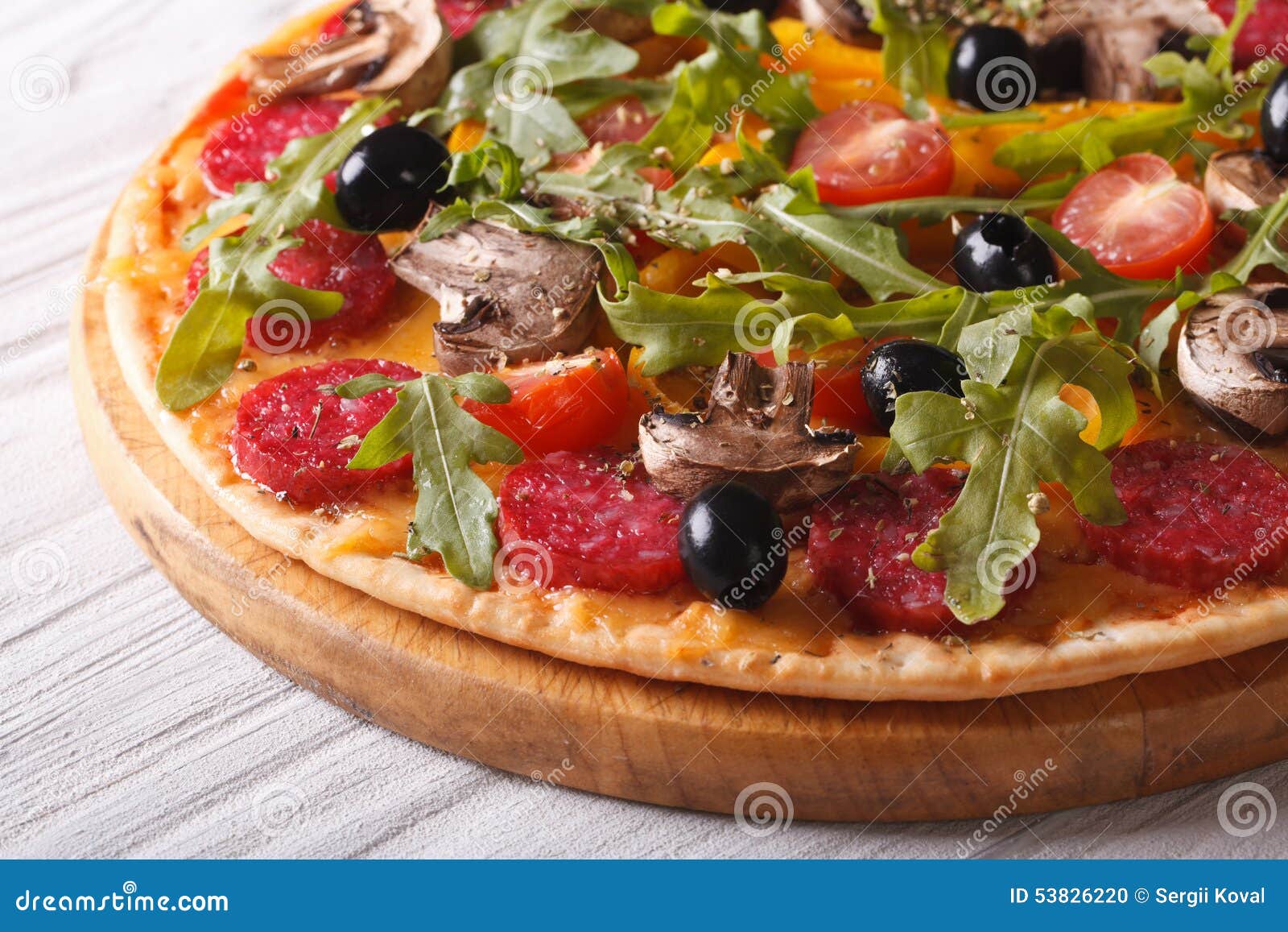 Delicious Pizza with Herbs, Vegetables and Salami Horizontal Stock