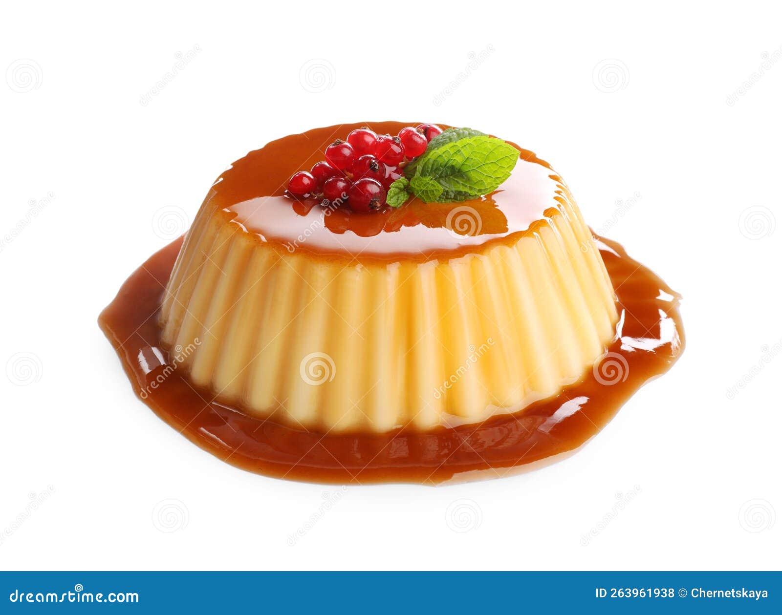 Delicious Pudding with Caramel, Redcurrants and Mint Isolated on White
