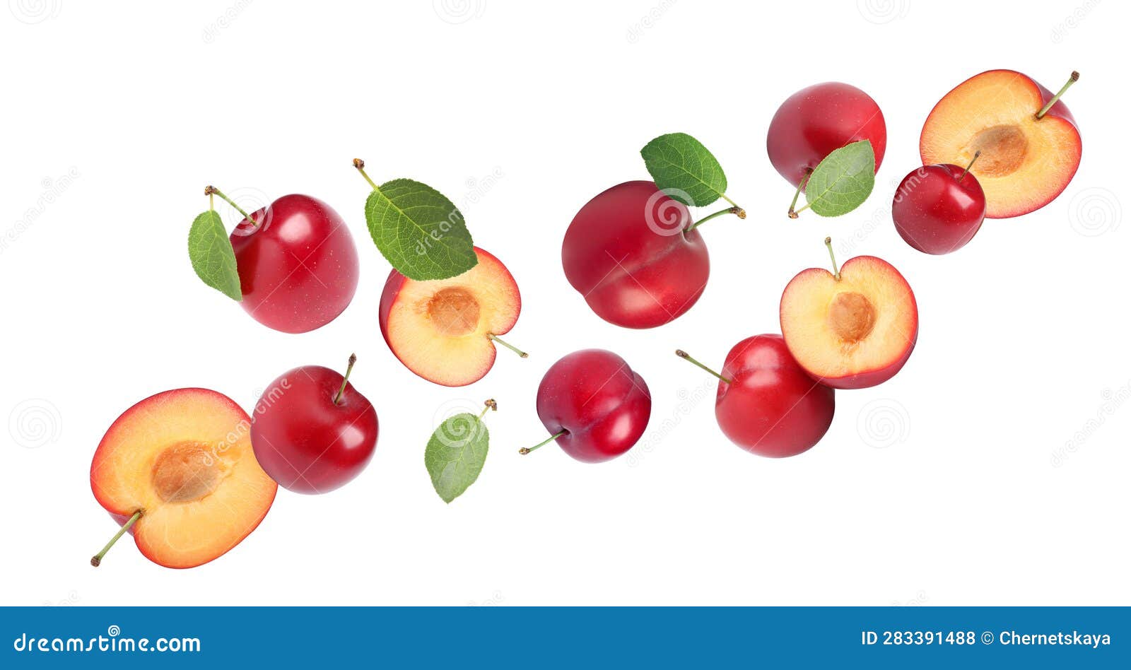 Delicious Ripe Cherry Plums with Leaves Falling Isolated on White Stock