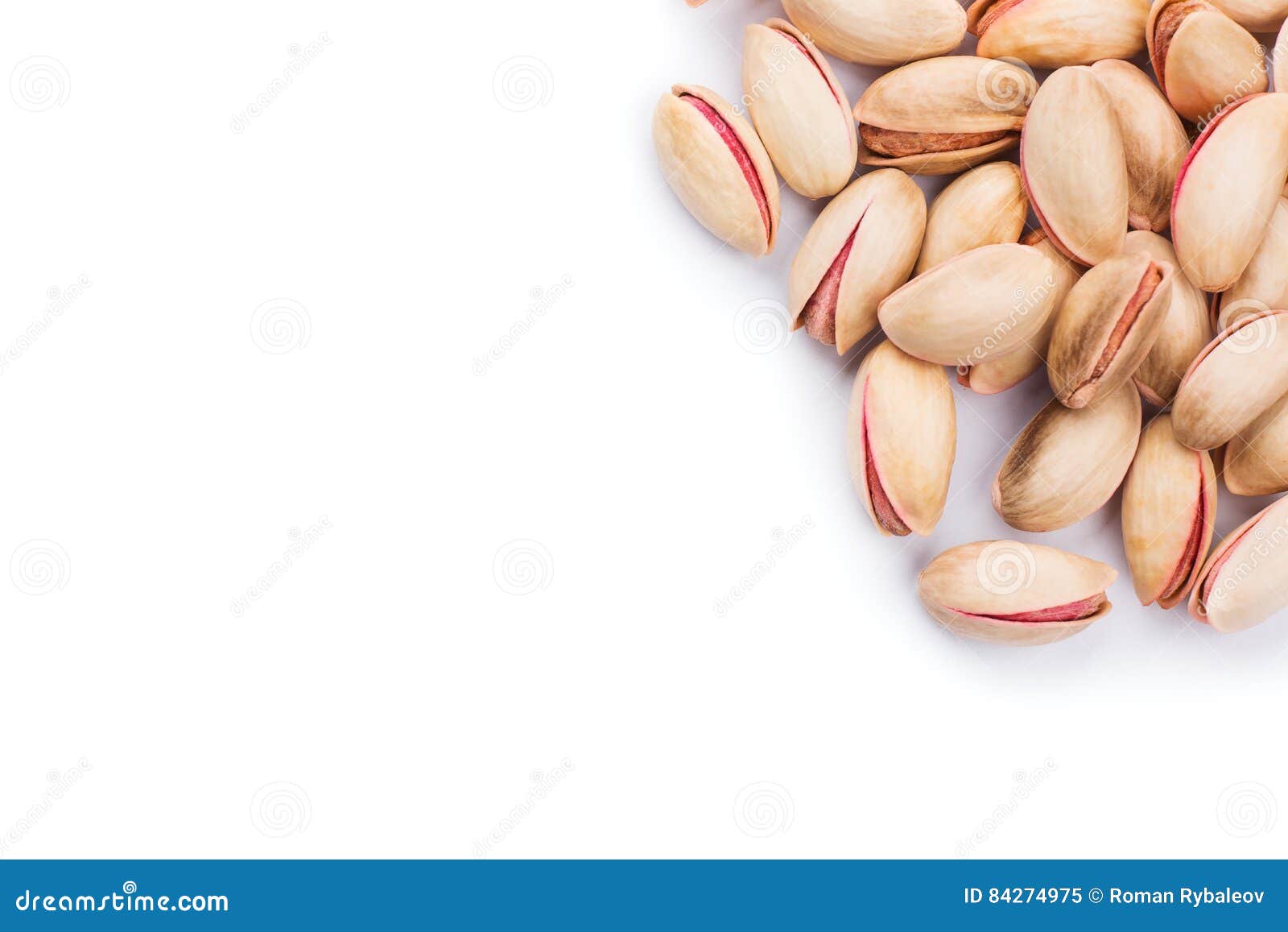 delicious roasted pistachios on a white background