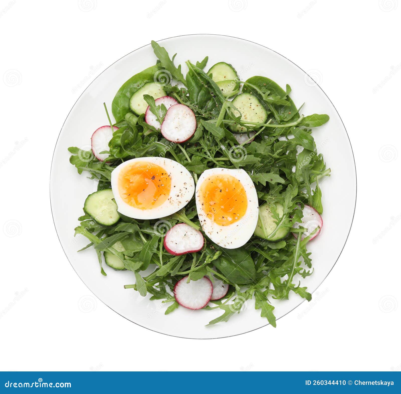 Delicious Salad with Boiled Egg, Vegetables and Arugula Isolated on White, Top View Stock Photo