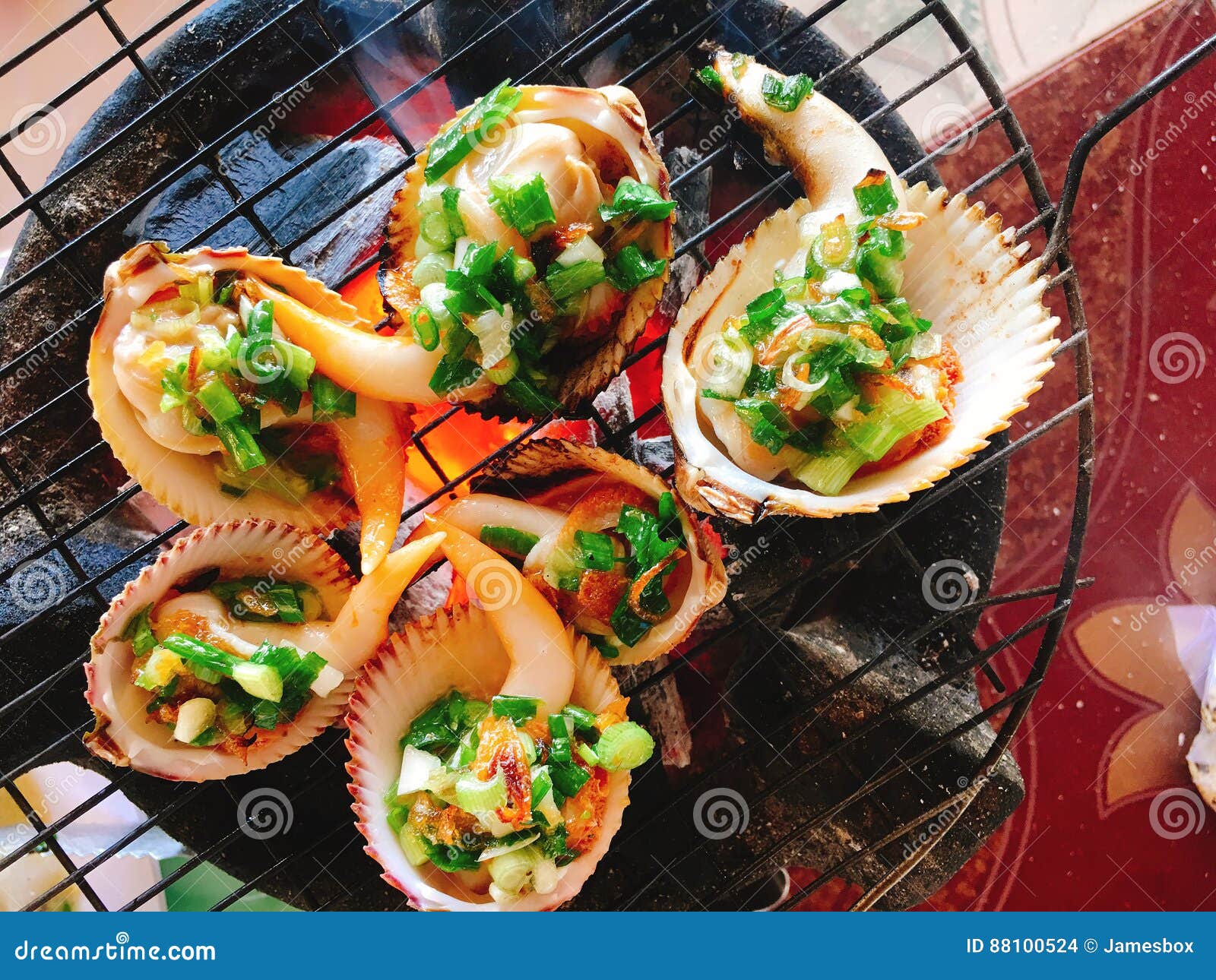 Delicious Shell or Clams Mussels on Hot Fire Coal Grill Stock Photo