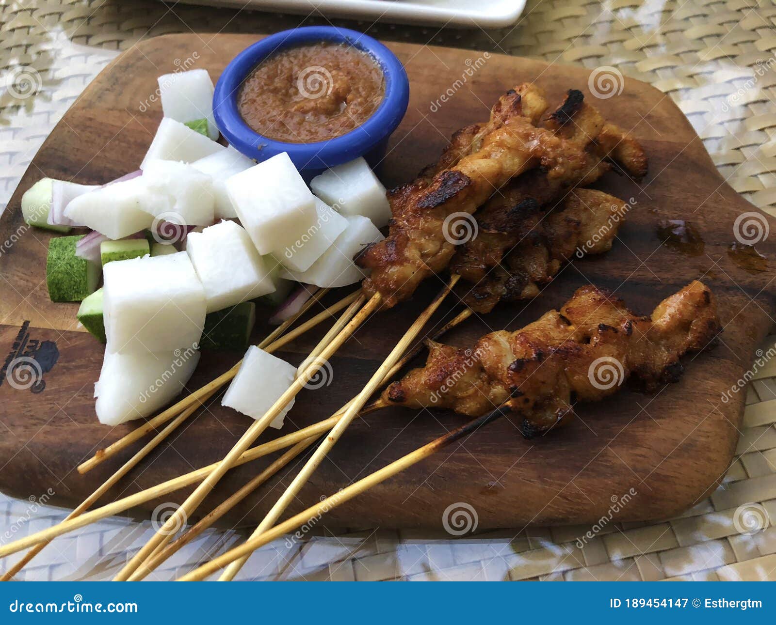 delicious singapore satay with ketupat and peanut sauce