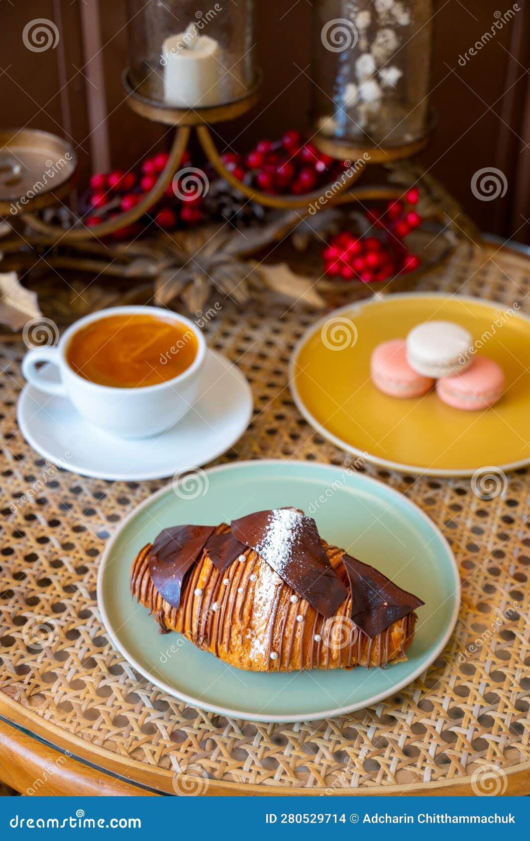 Delicious Snacks with Chocolate Croissant Pastry, Coffee and Macarons